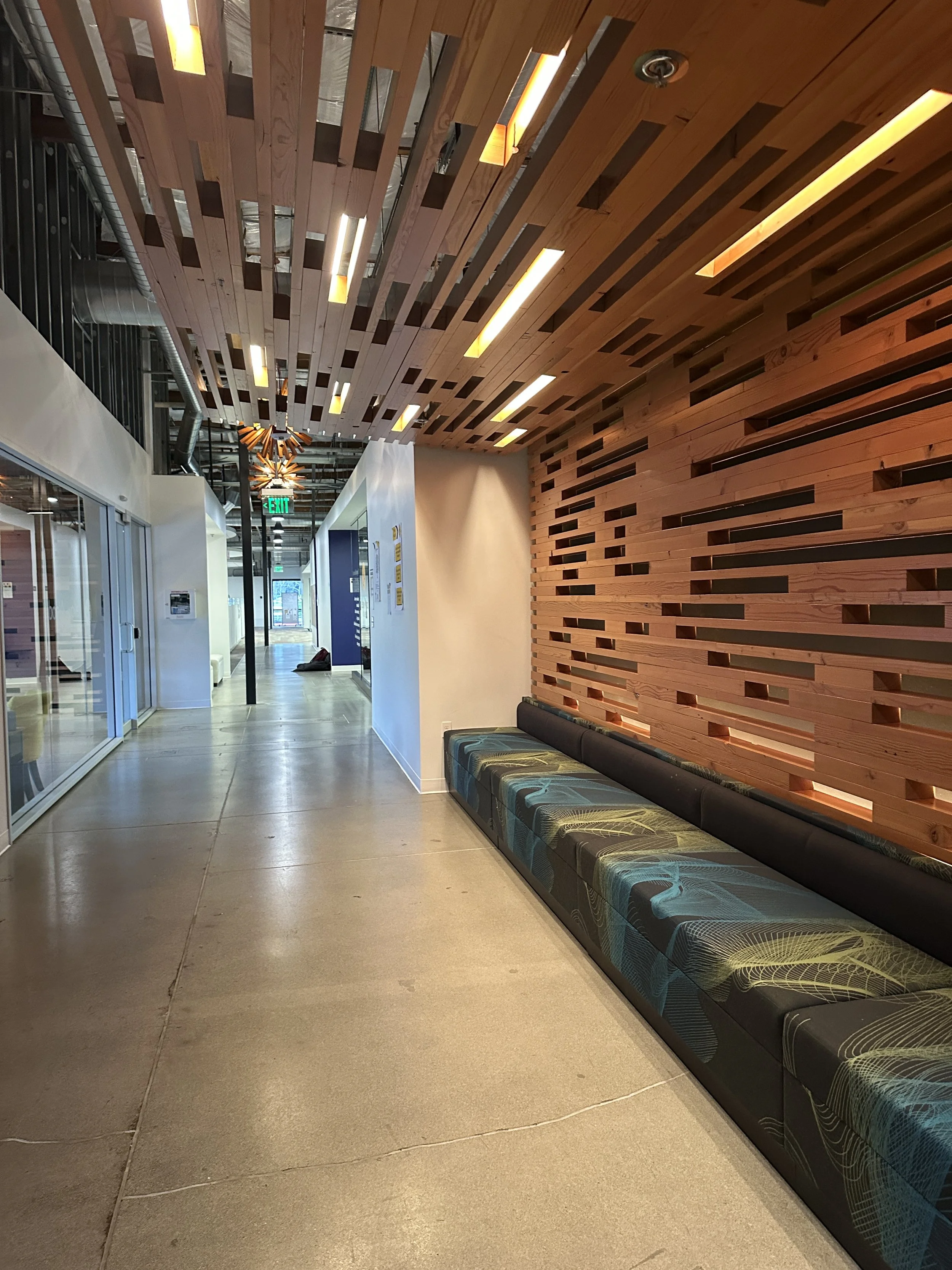 Yellow Wood Academy entrance hallway leading to the cafeteria with modern seating area