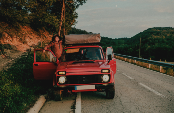 Geometric drawing of an outline square with sections divided by vertical, horizontal, and half circle lines.