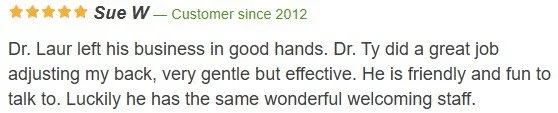 Customer review with five stars, praising Dr. Laur and Dr. Ty for their care and friendly demeanor.