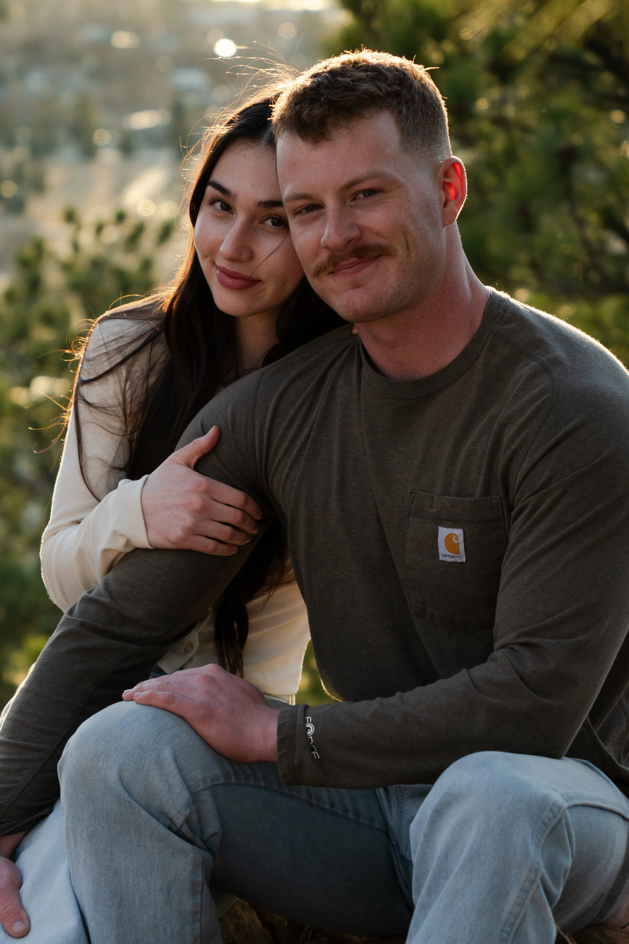 Sunset Couple Sitting at Skyline Dr
