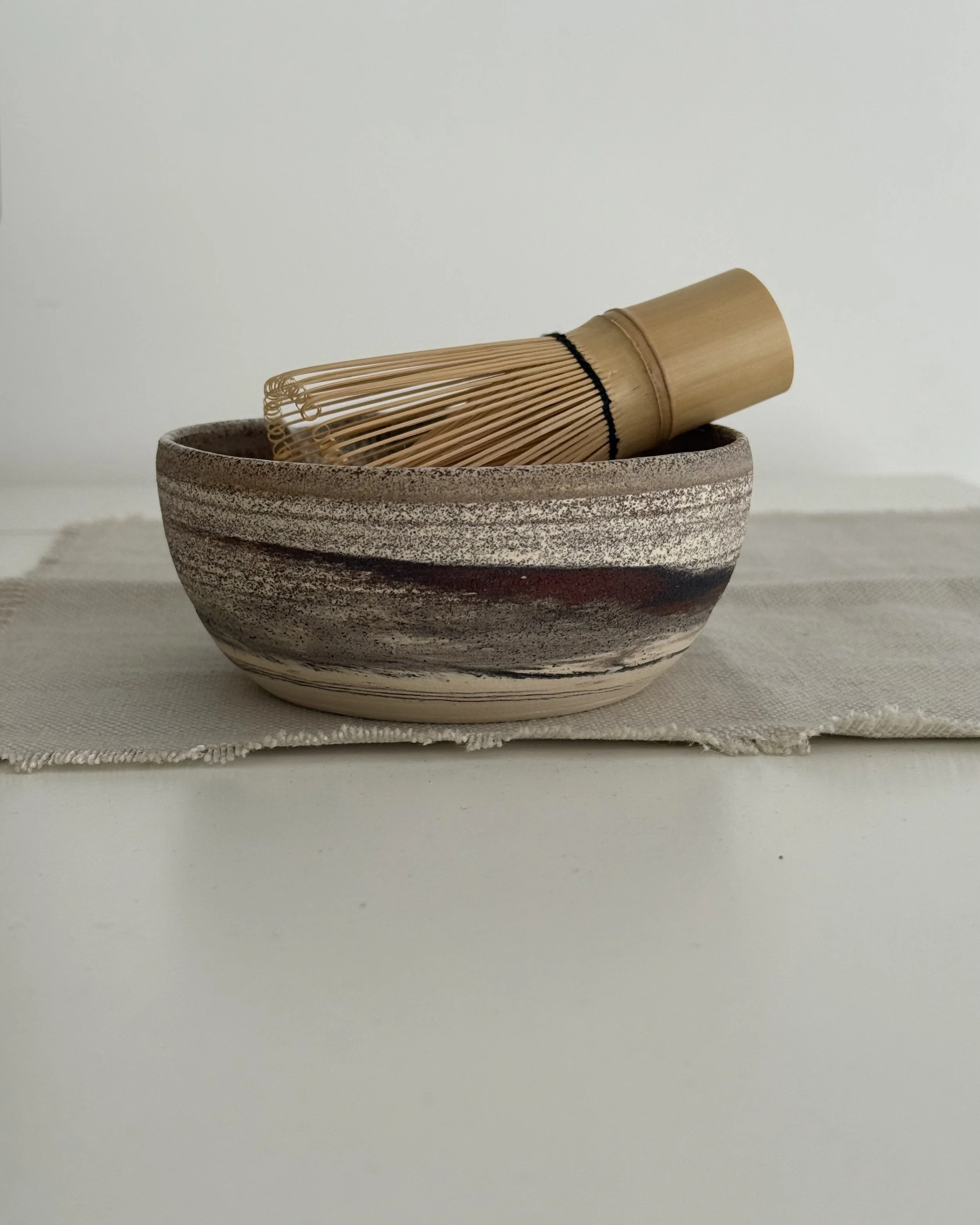 mixed clay and speckled matcha bowl