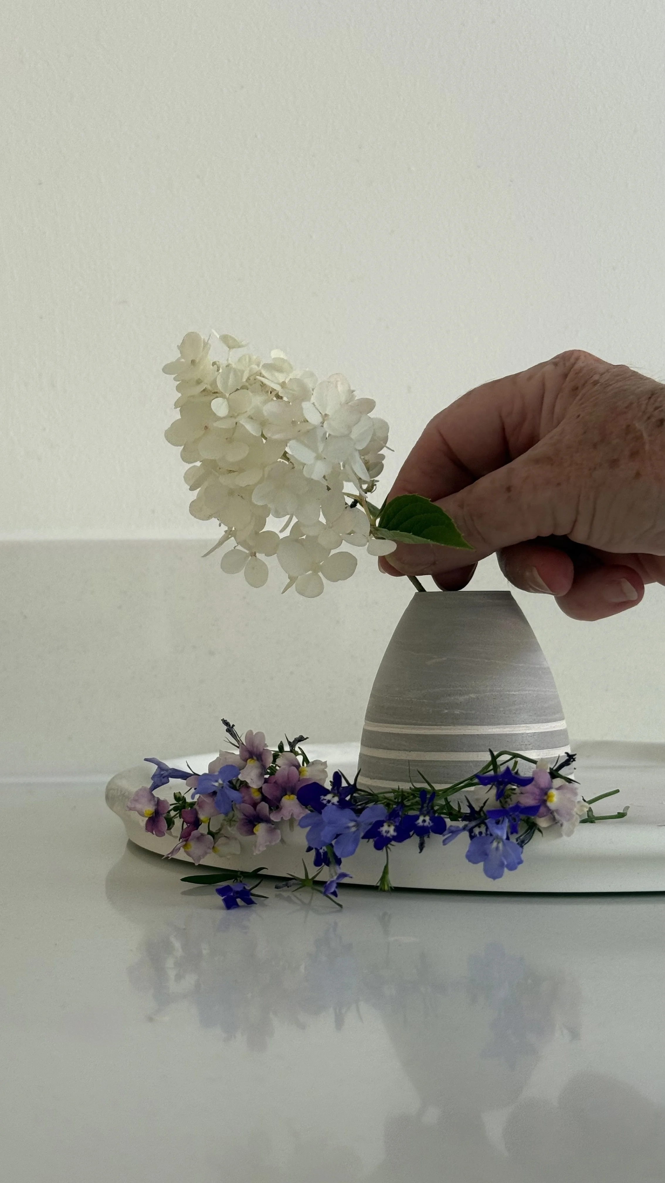 tiny bud vase with engraved lines