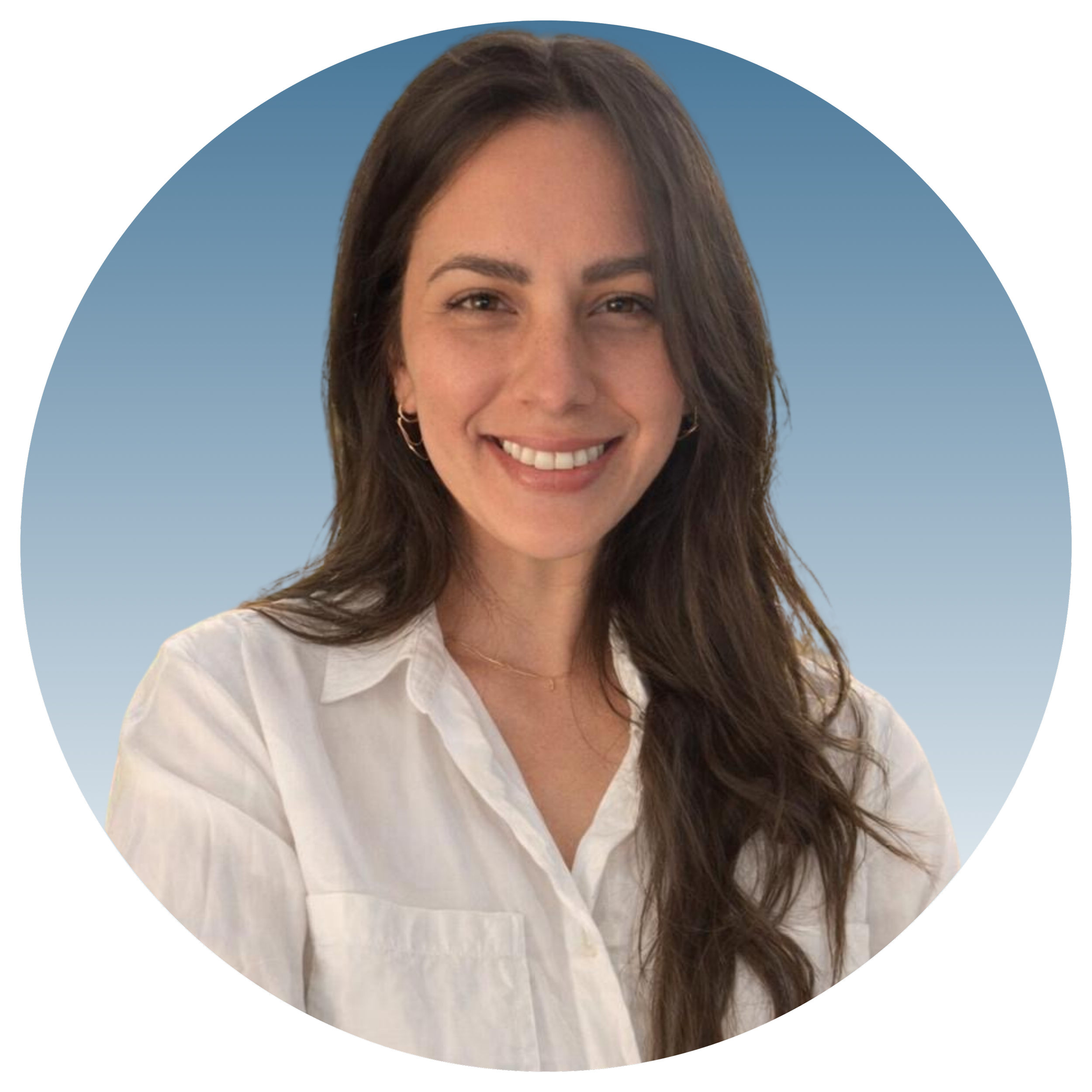 A woman with long brown hair wearing a white shirt smiling against a gradient blue background.