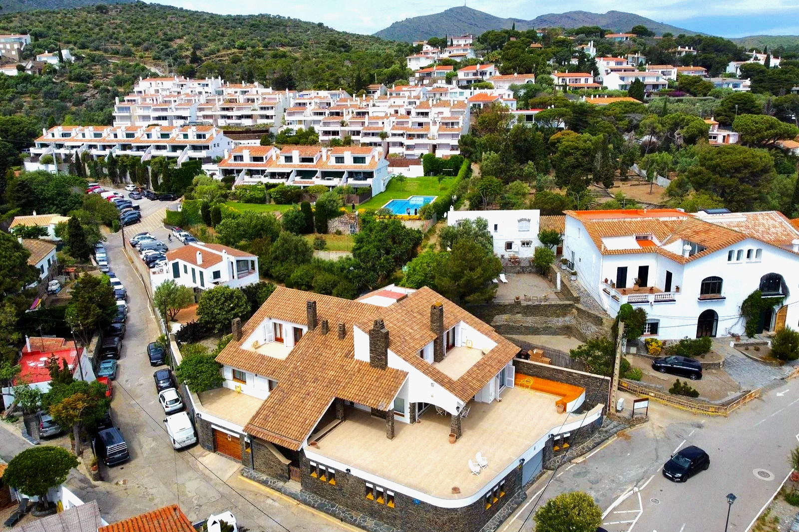 Drone view of the exclusive rental house in Cadaqués, front-line to the sea on Llané beach.
