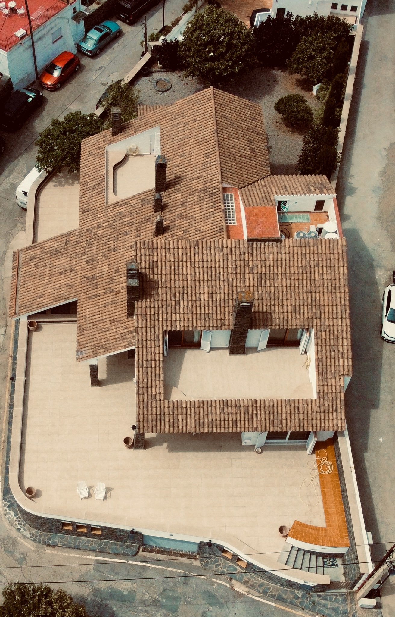 Drone view of the exclusive rental house in Cadaqués, front-line to the sea on Llané beach.