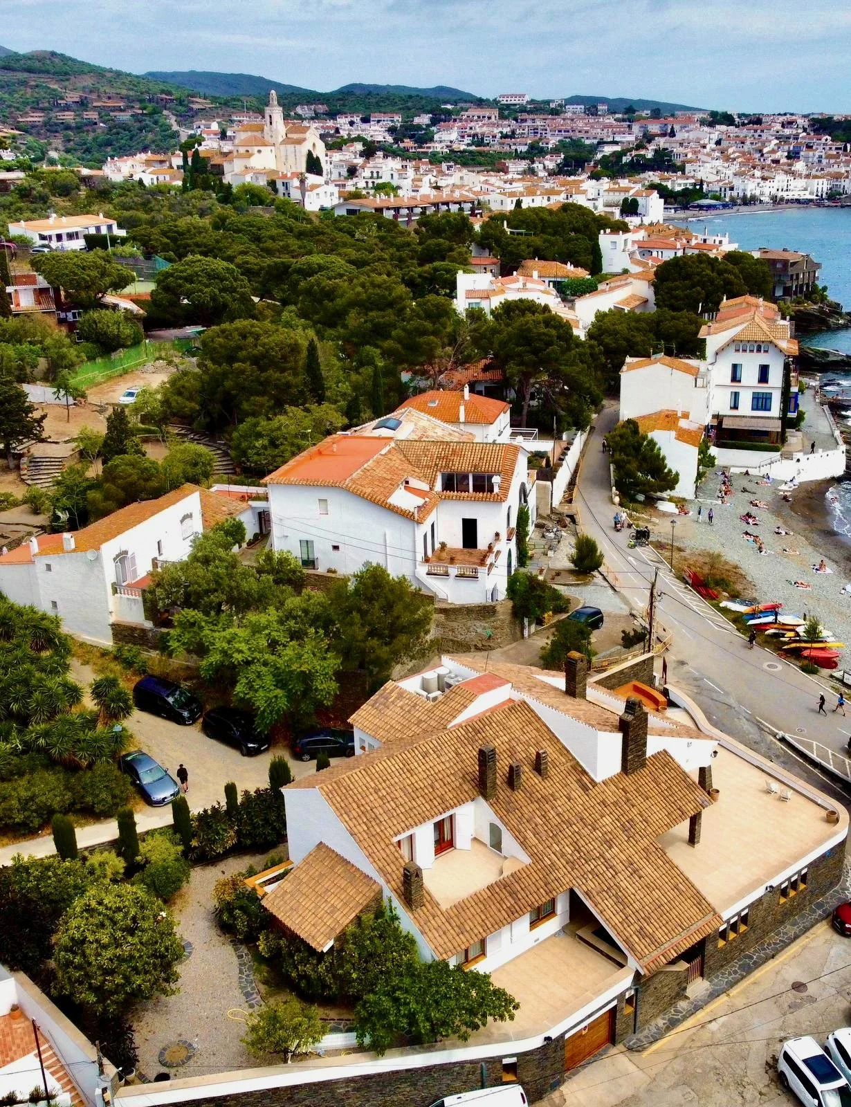 Drone view of the exclusive rental house in Cadaqués, Costa Brava, front-line to the sea on Llané beach.