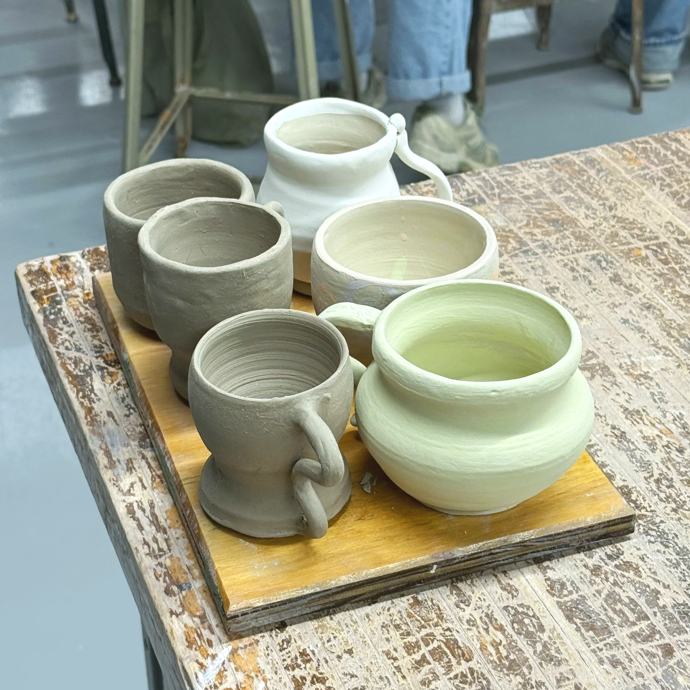 My first batch of mugs, (before bisque firing), wheel thrown, 2025.