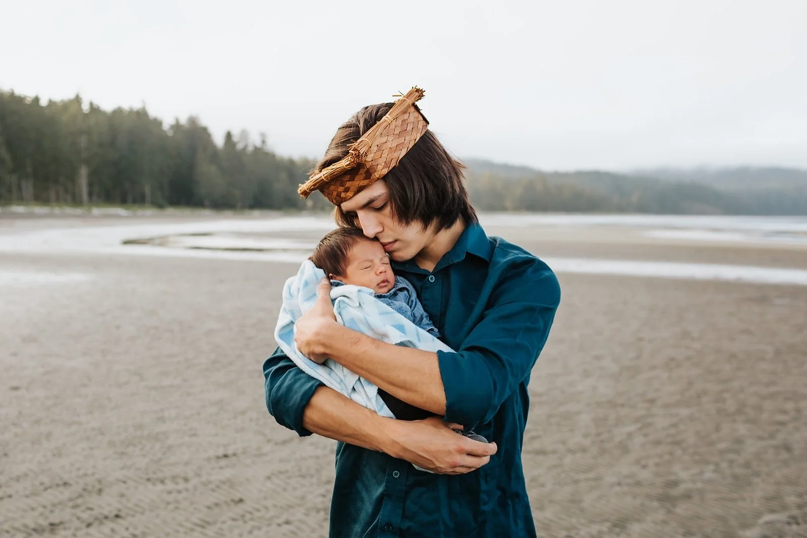 One of my favourite images and you may recognize it as I&rsquo;ve shared it before.

A father holding his newborn son on the beach, singing lullabies in our language &mdash; Kwak&rsquo;wala while rocking him asleep.

Today feels like the perfect day 