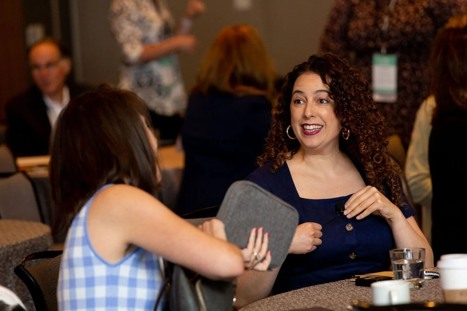 Professional reading Remotivation by Sarah Aviram to advance their career, set boundaries, and rediscover joy and meaning in their work