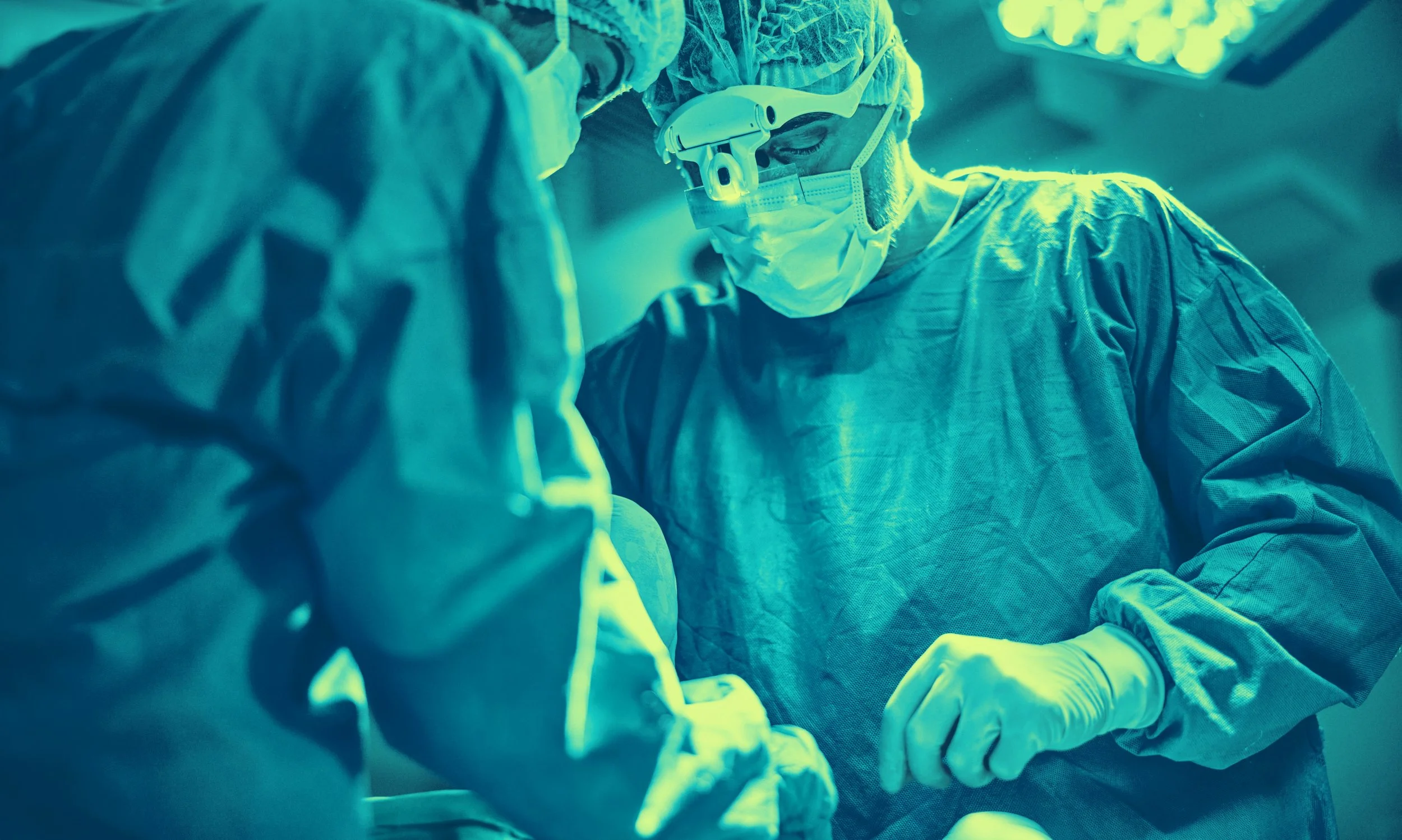 Surgical team performing endovascular procedure representing Cagent Vascular's mission in patient care