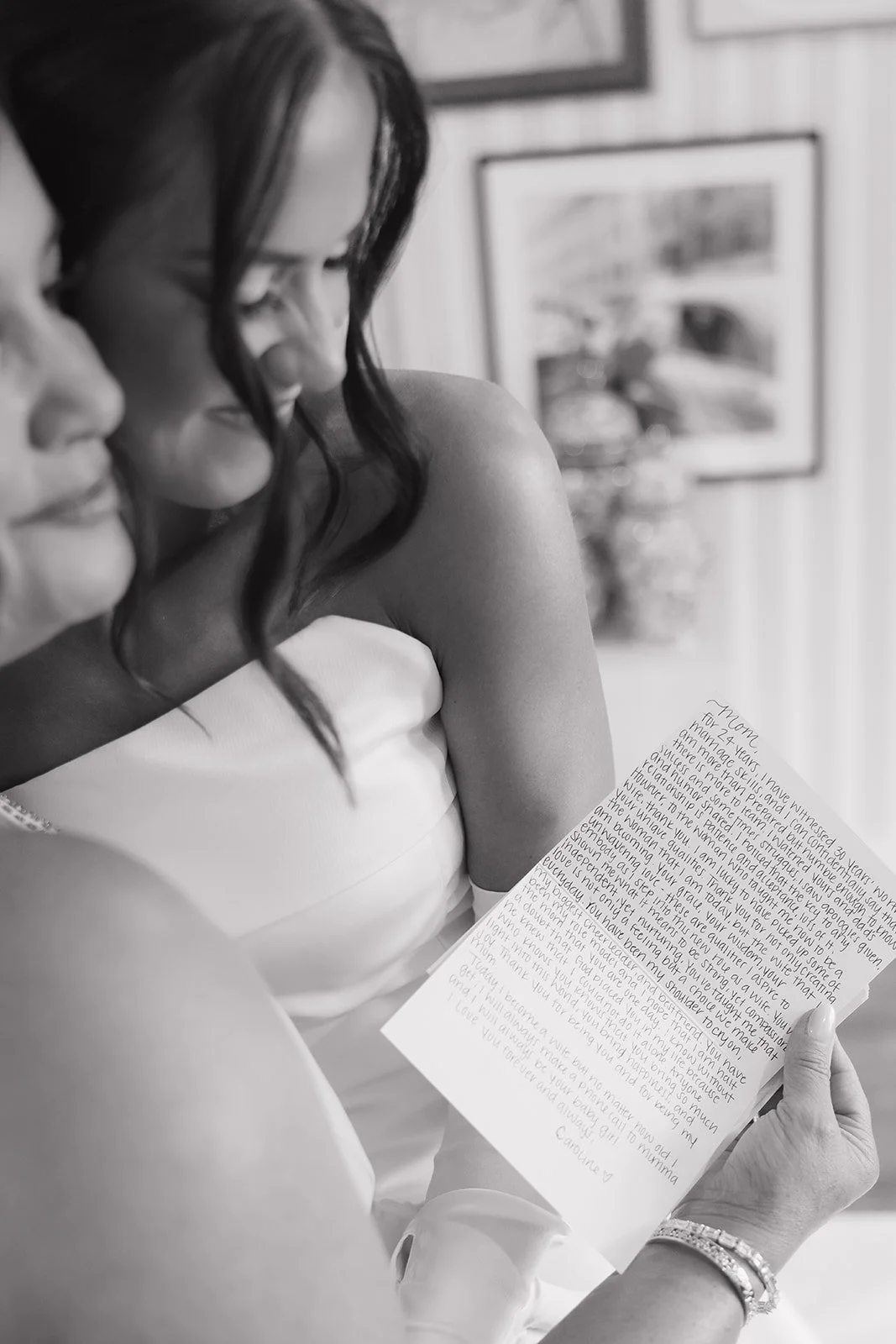 Bride shares a letter with her mom during wedding day.