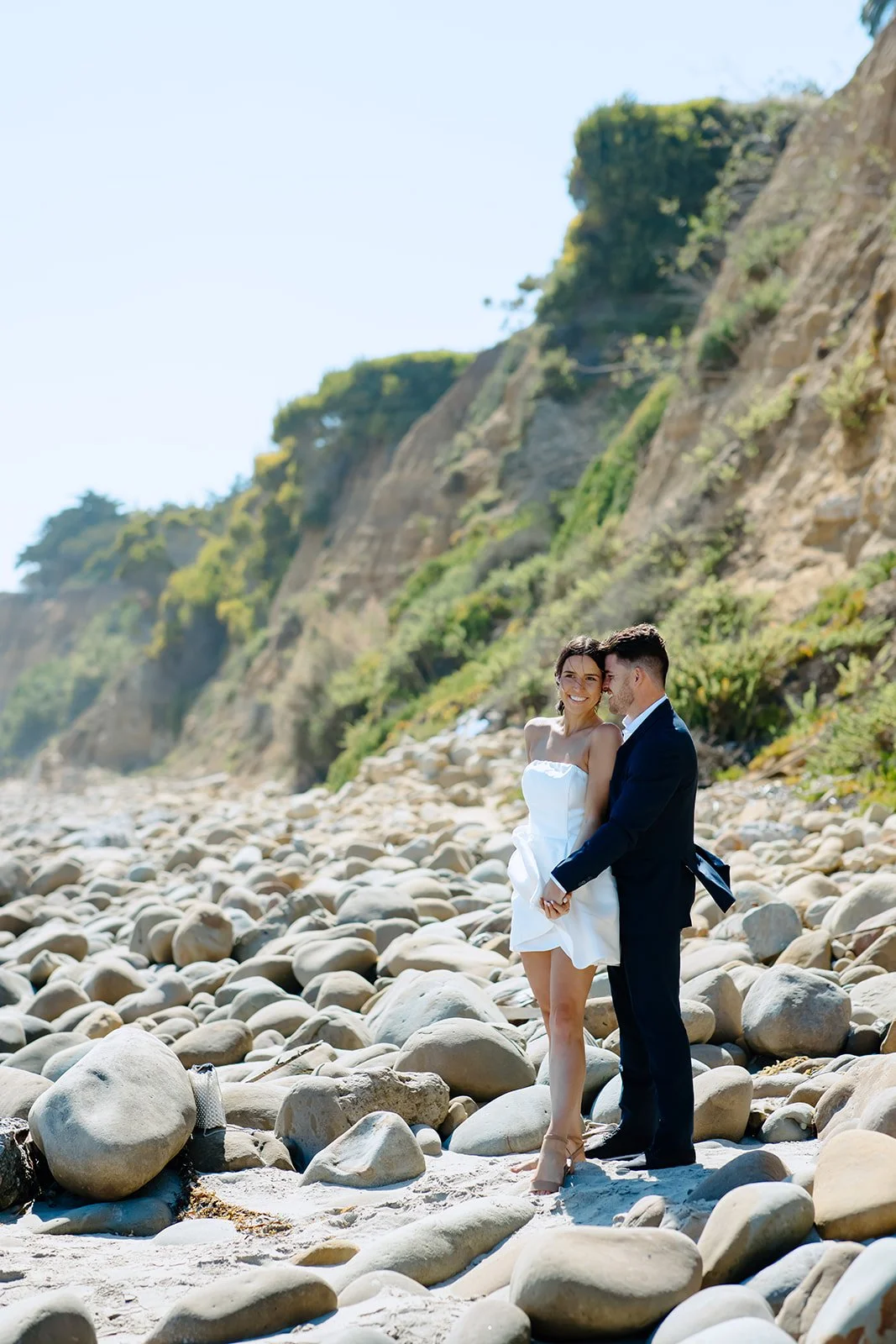 Waterfront couple portrait with clean, intentional framing.