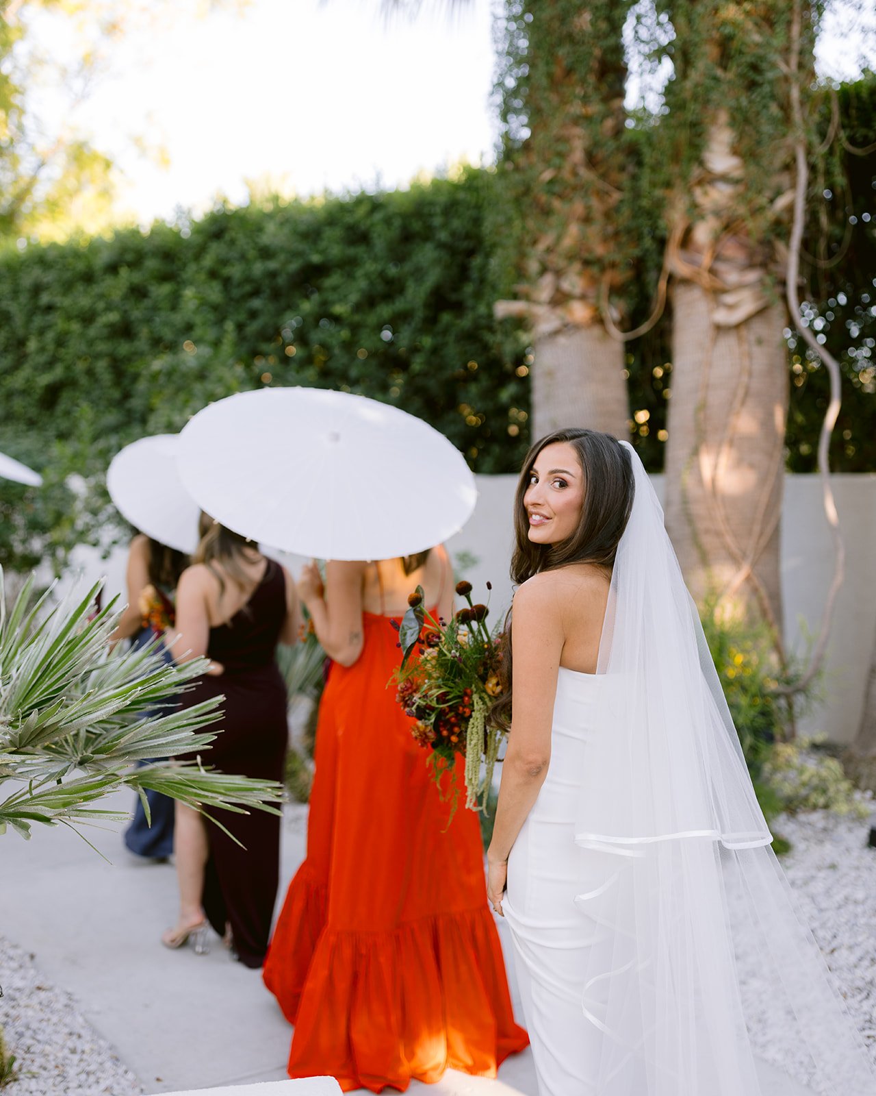 Bridesmaids walking to wedding ceremony in Ponte Vedra.