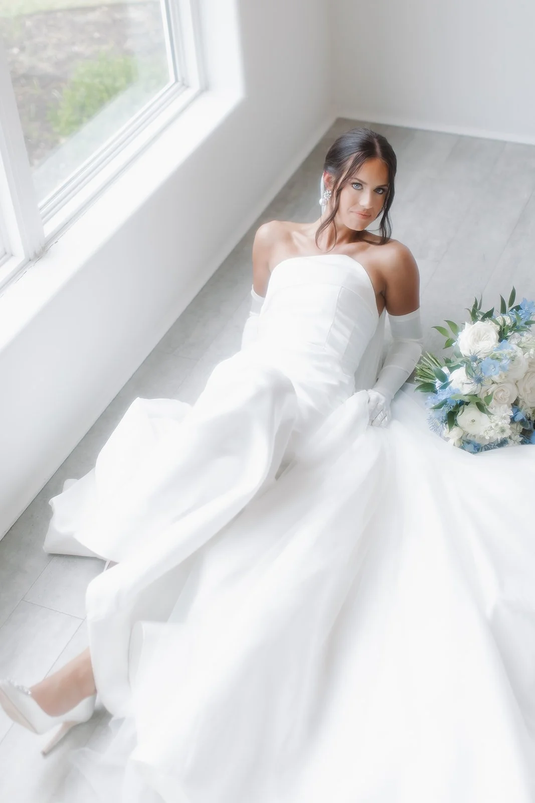 Editorial bridal portrait captured with structured composition and natural light.