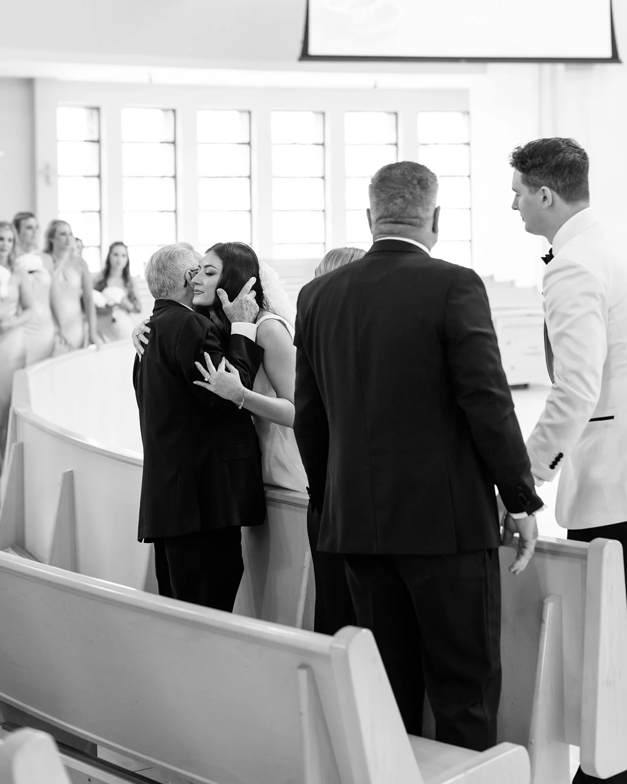 Bride shares an emotional moment with her grandfather.