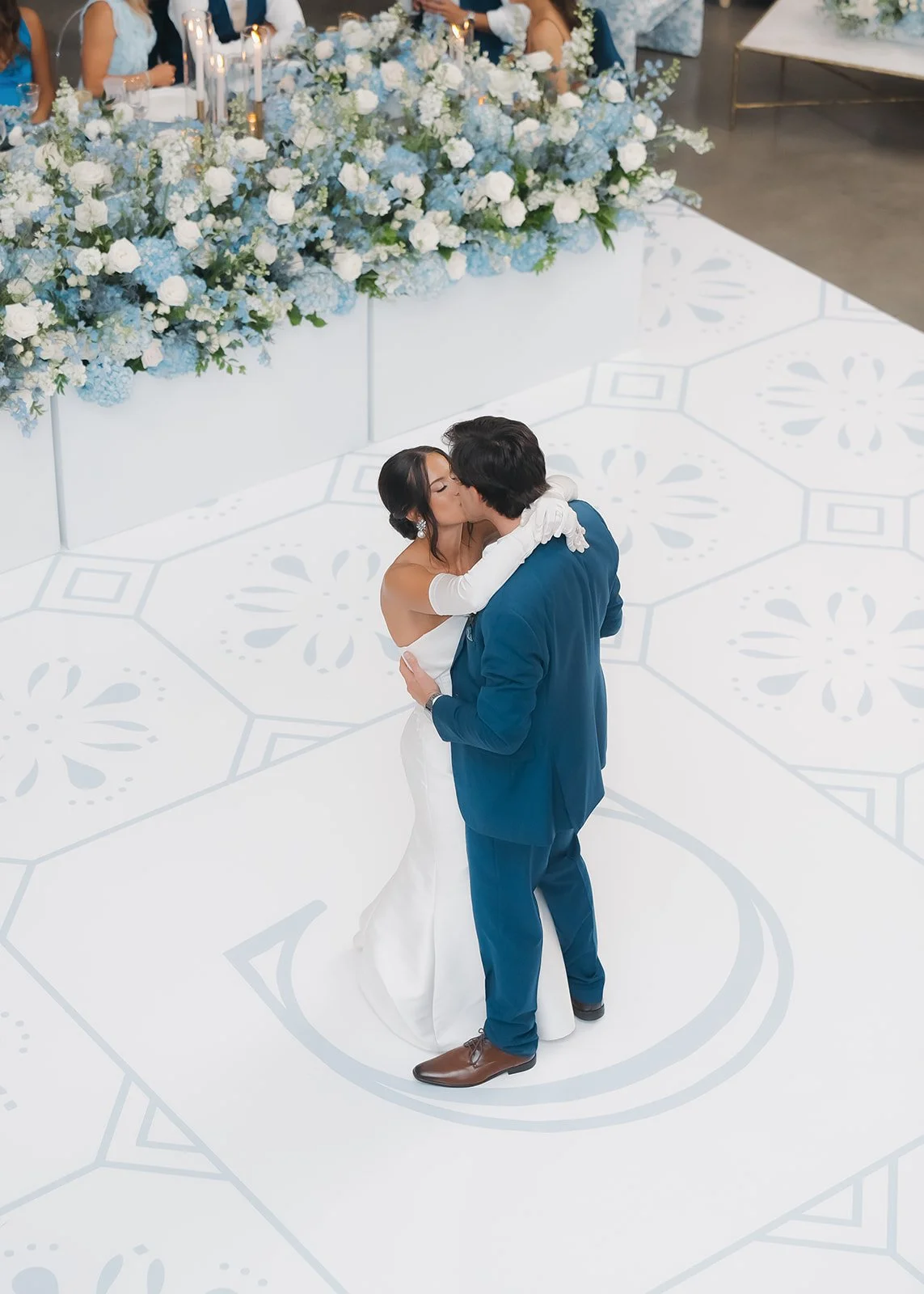 Aerial shot of bride and groom dancing.