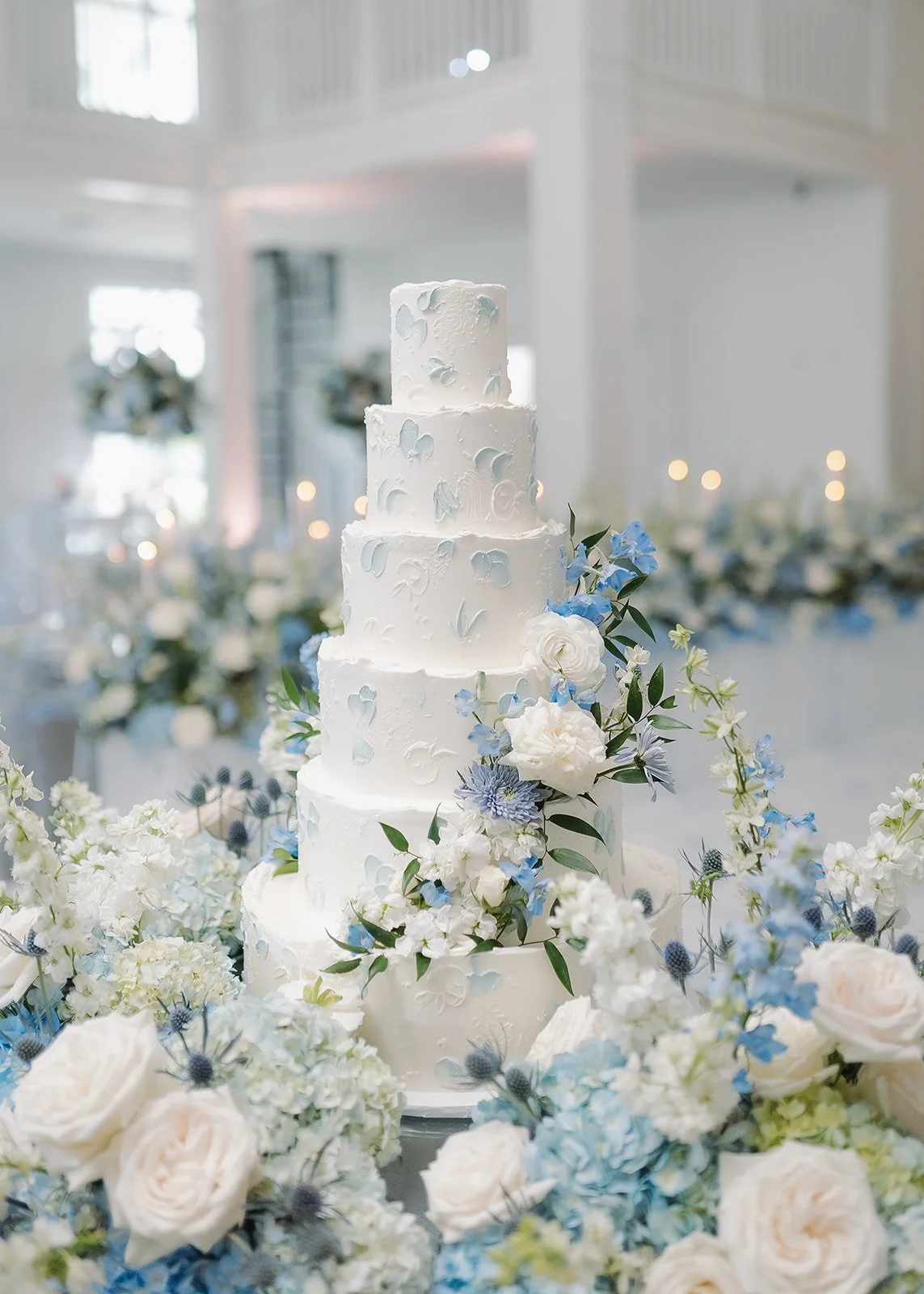 Wedding cake detail shot during blue-themed wedding.