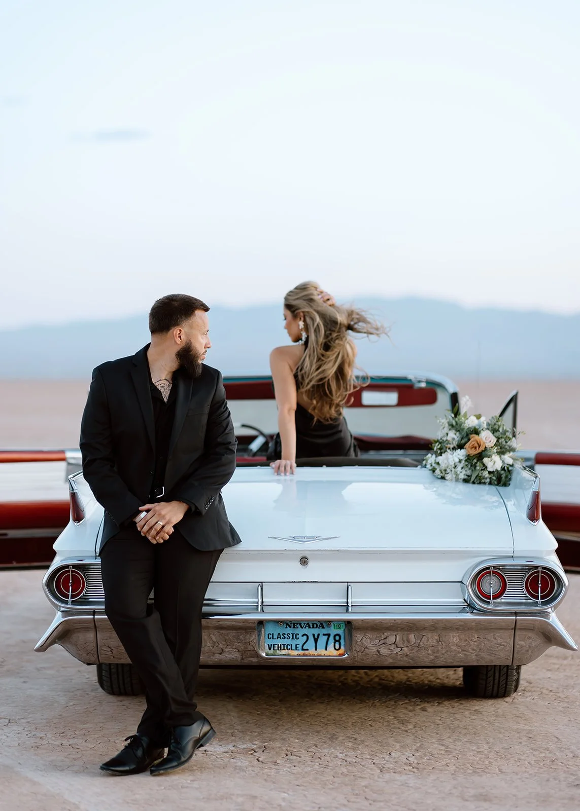 Couple engagement shoot with classic car.