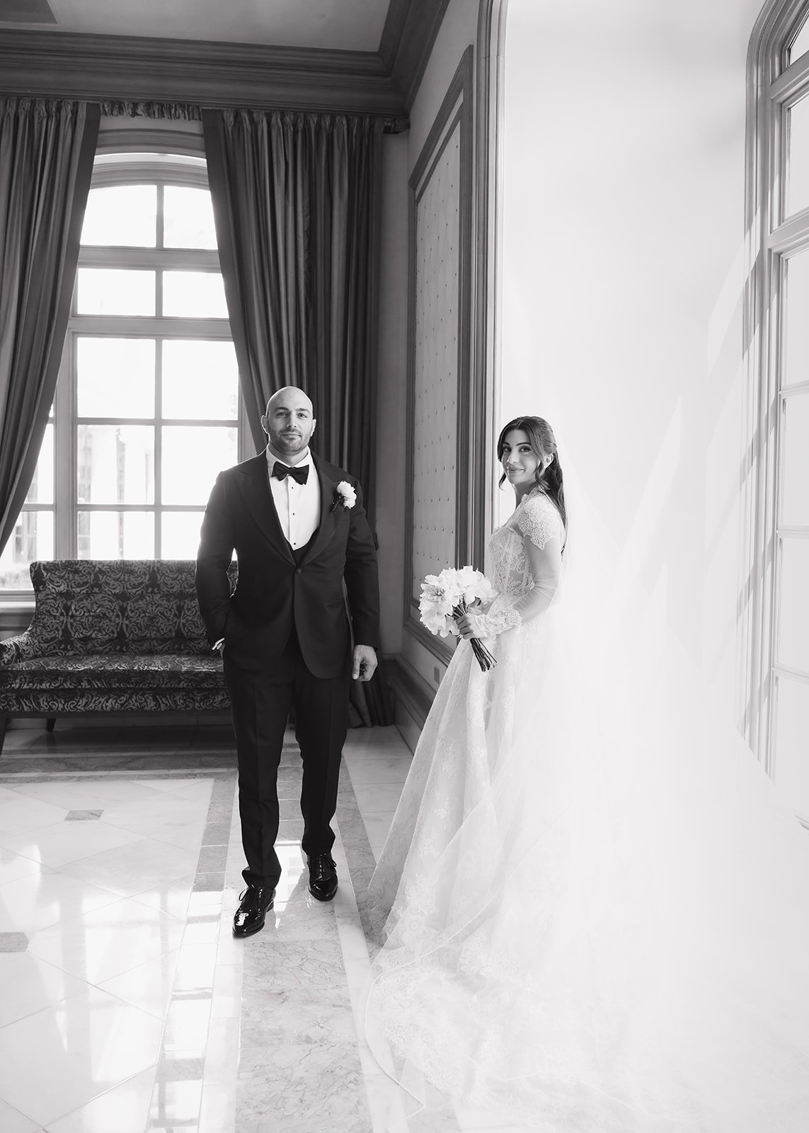 Bride and groom posed together during editorial wedding portrait.
