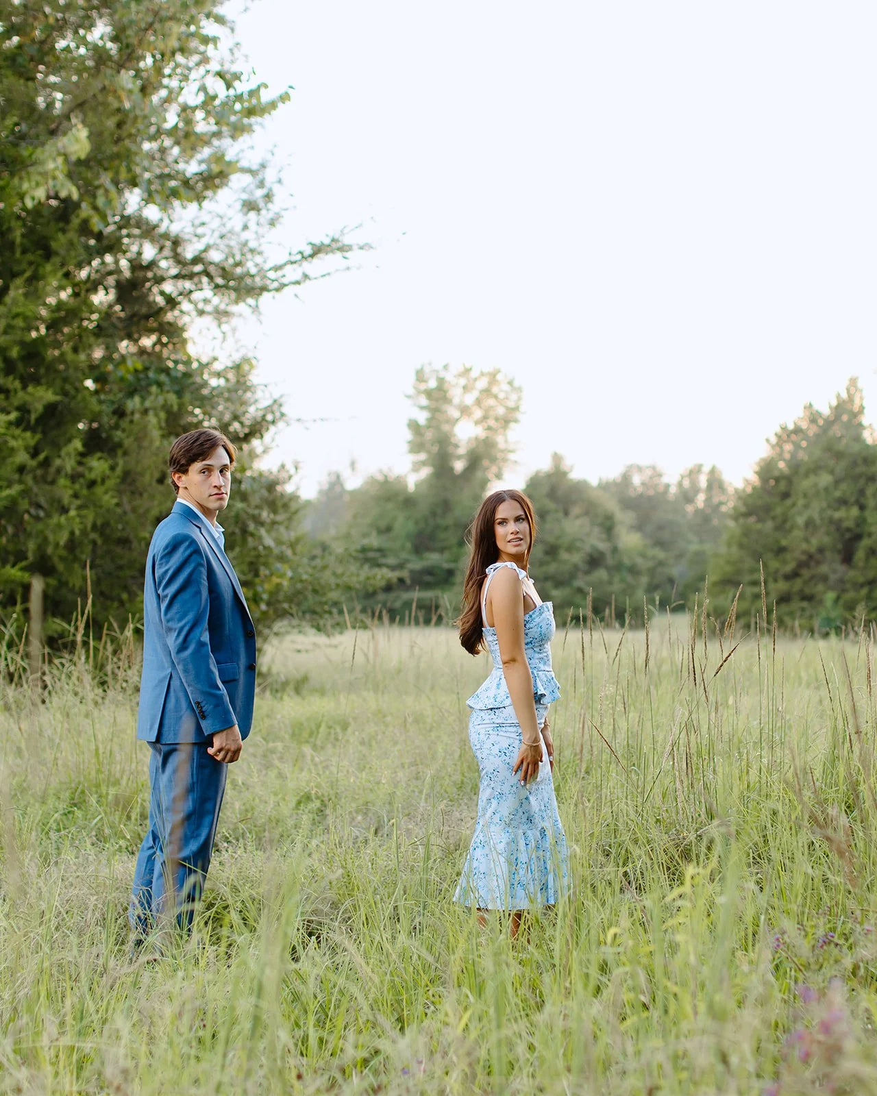Romantic engagement portrait captured in soft natural light.