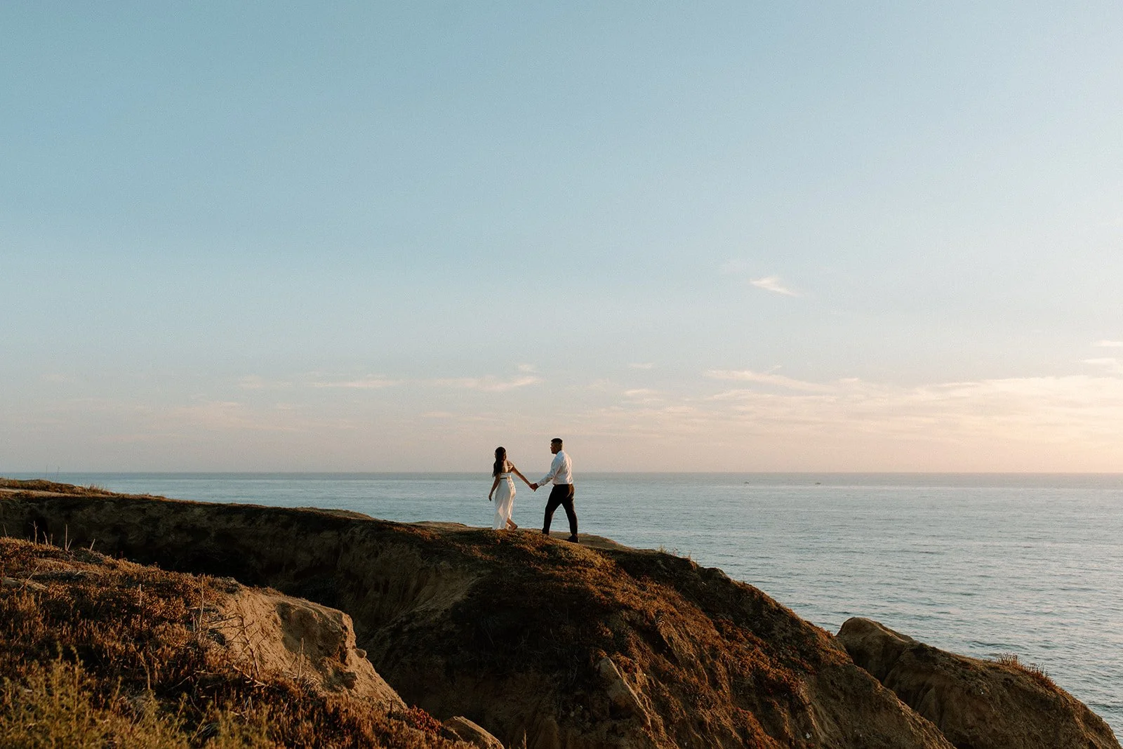 Coastal engagement photoshoot with newly engaged couple.