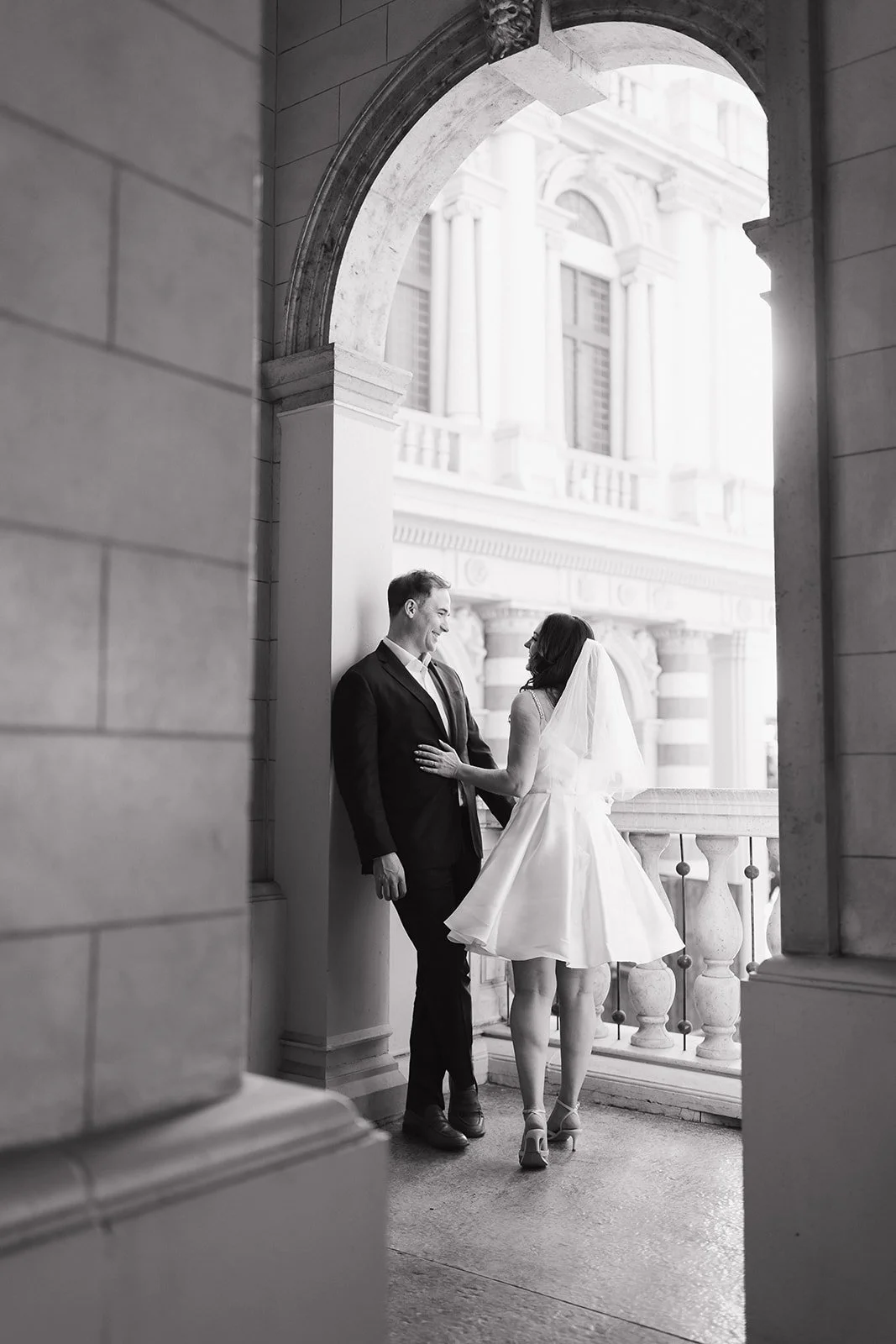 Bride and groom posed together during  engagement portrait.