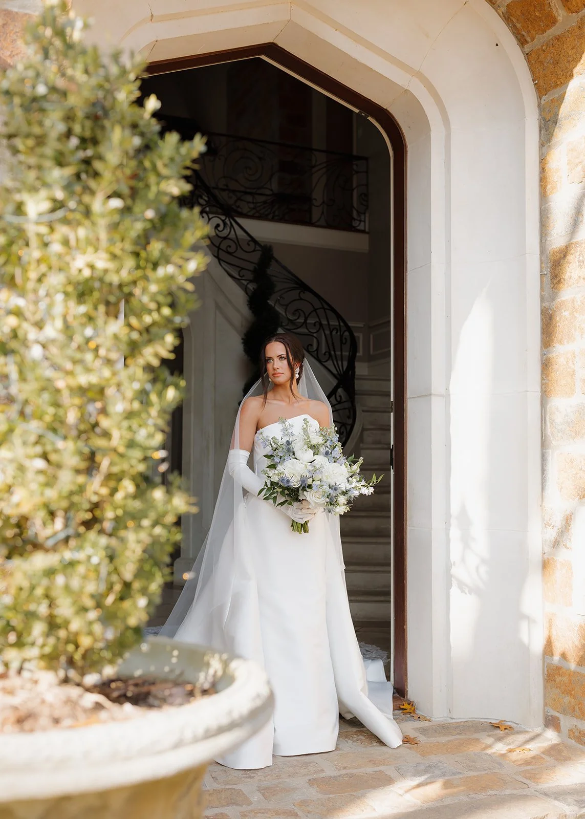 Bride captured in a minimal, fashion-forward portrait with clean lines.