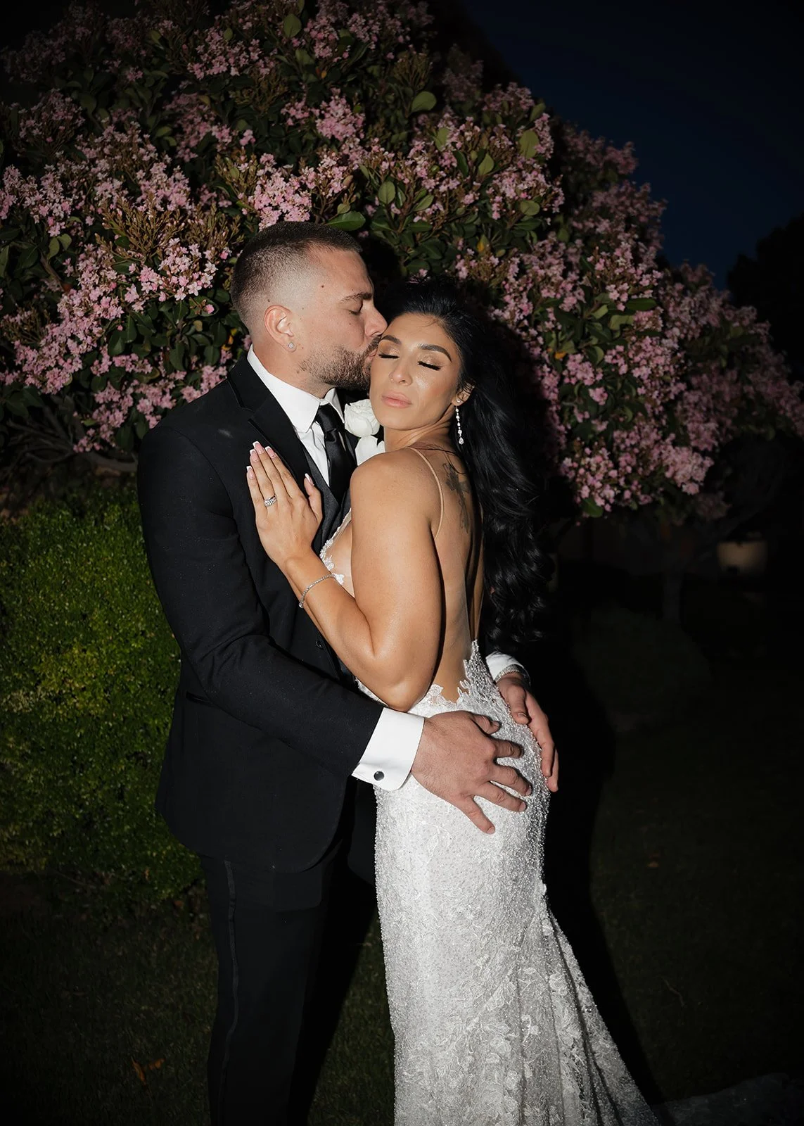 Minimal, fashion-inspired couple portrait with structured posing.