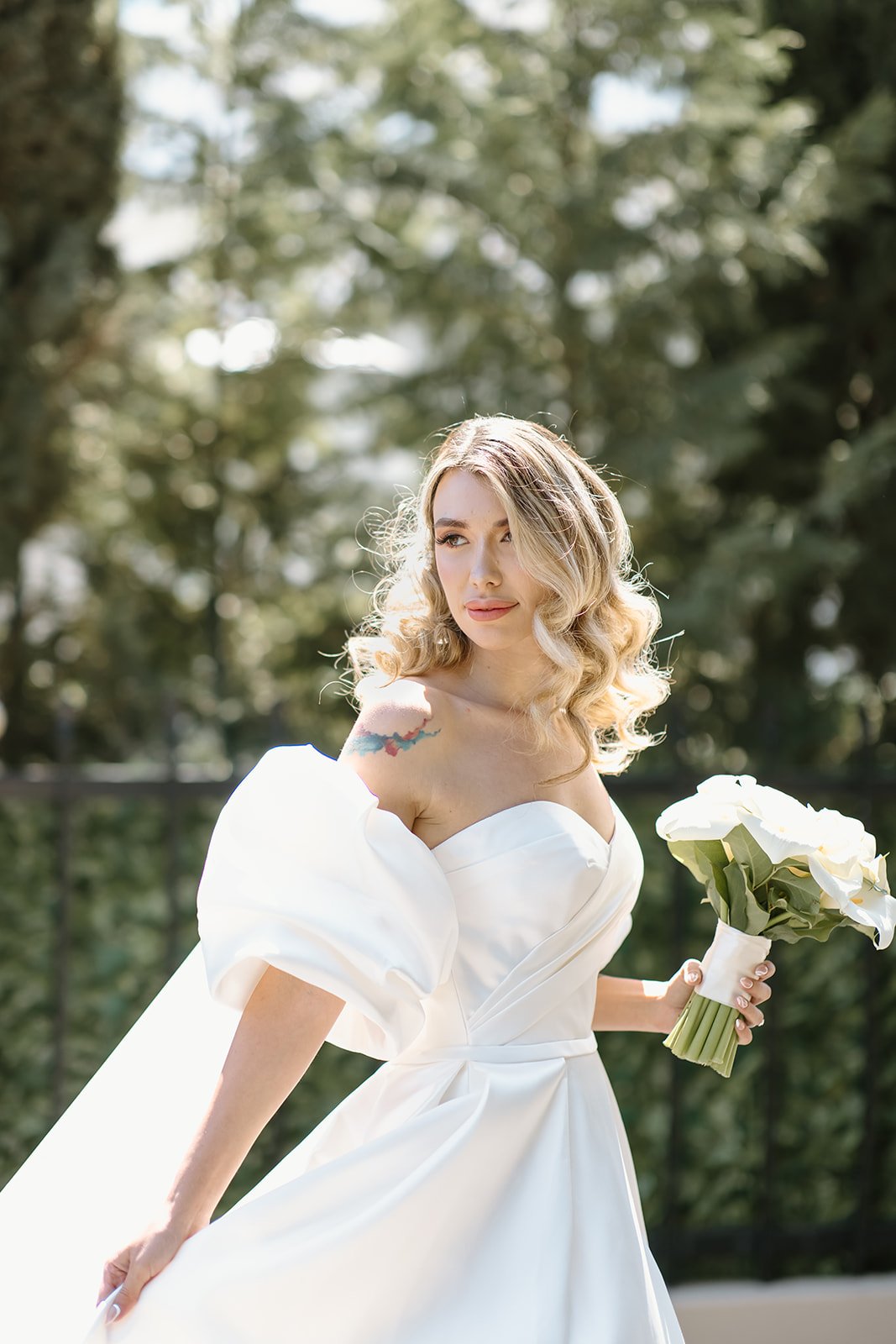 Romantic walking portrait at black tie wedding.