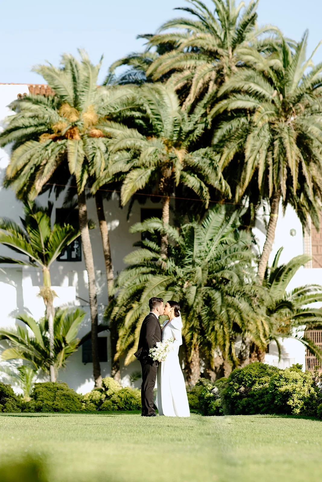 Couple posed during golden hour with clean framing.