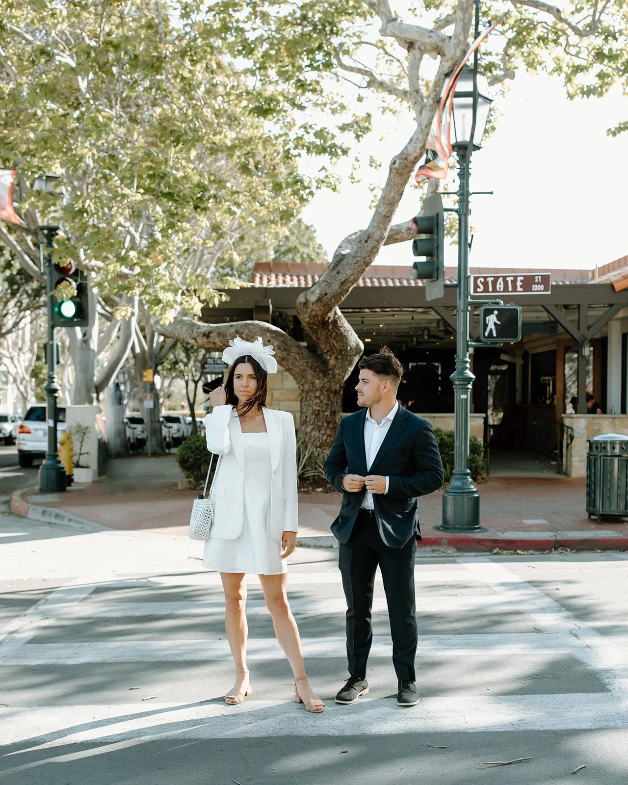Intentional posing during city engagement photos.
