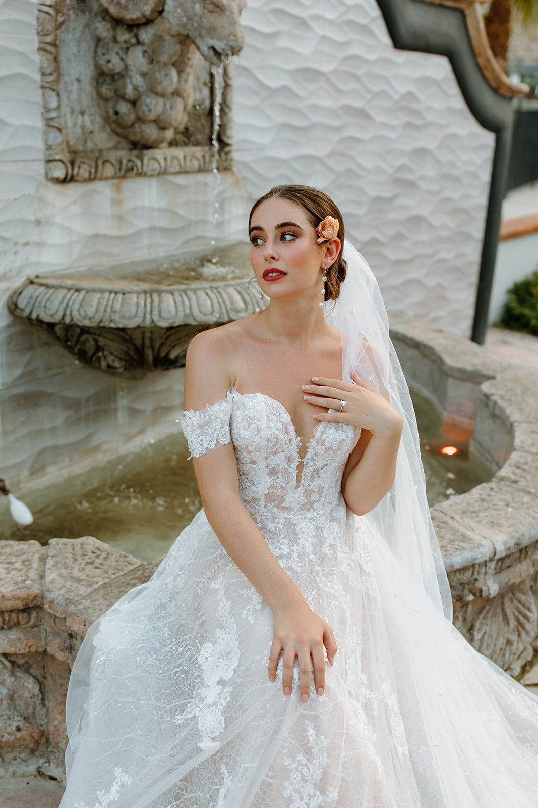 Luxurious bridal portrait blending subtle emotion with a contemporary sensibility.