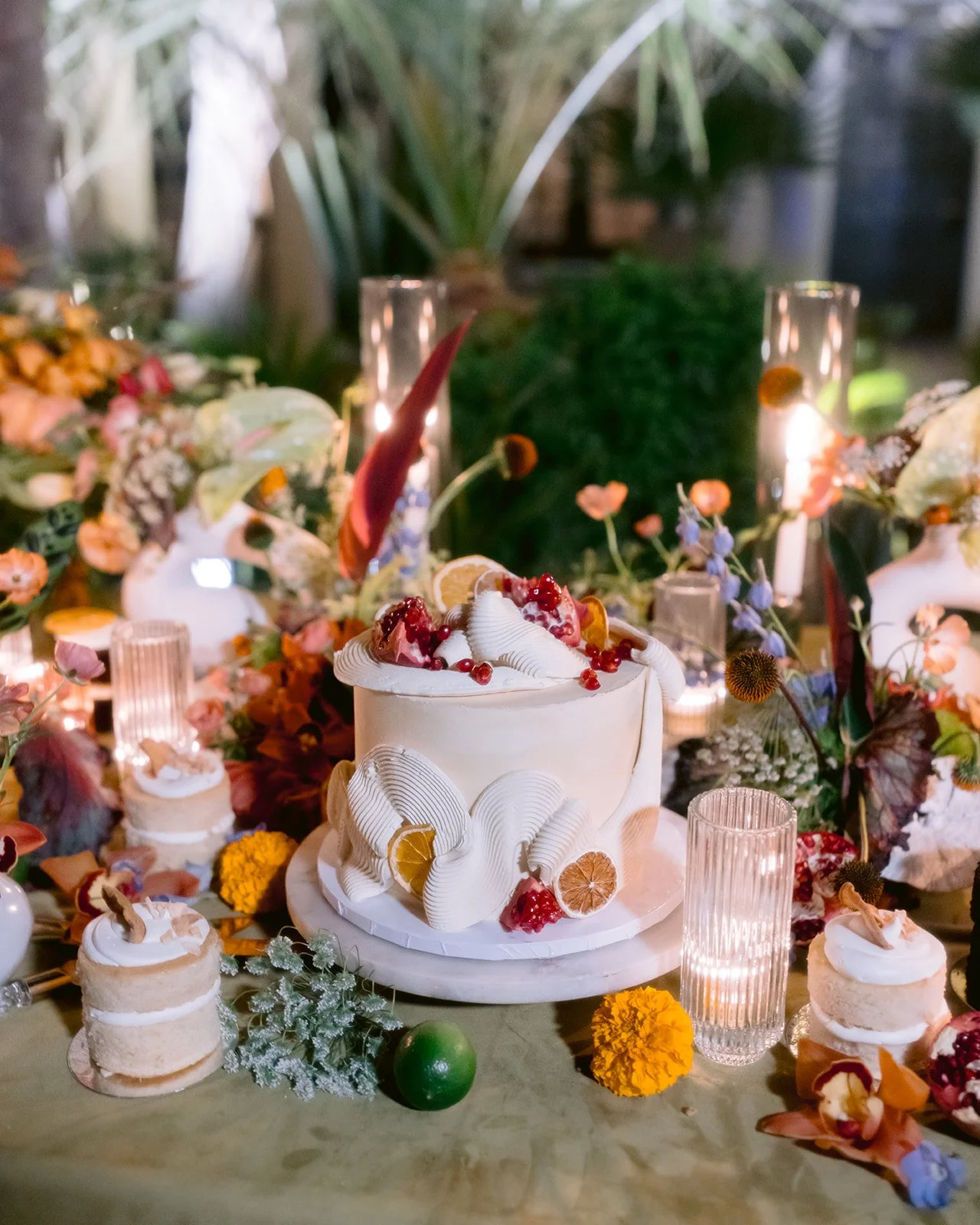 Creative wedding cake during colorful themed reception.
