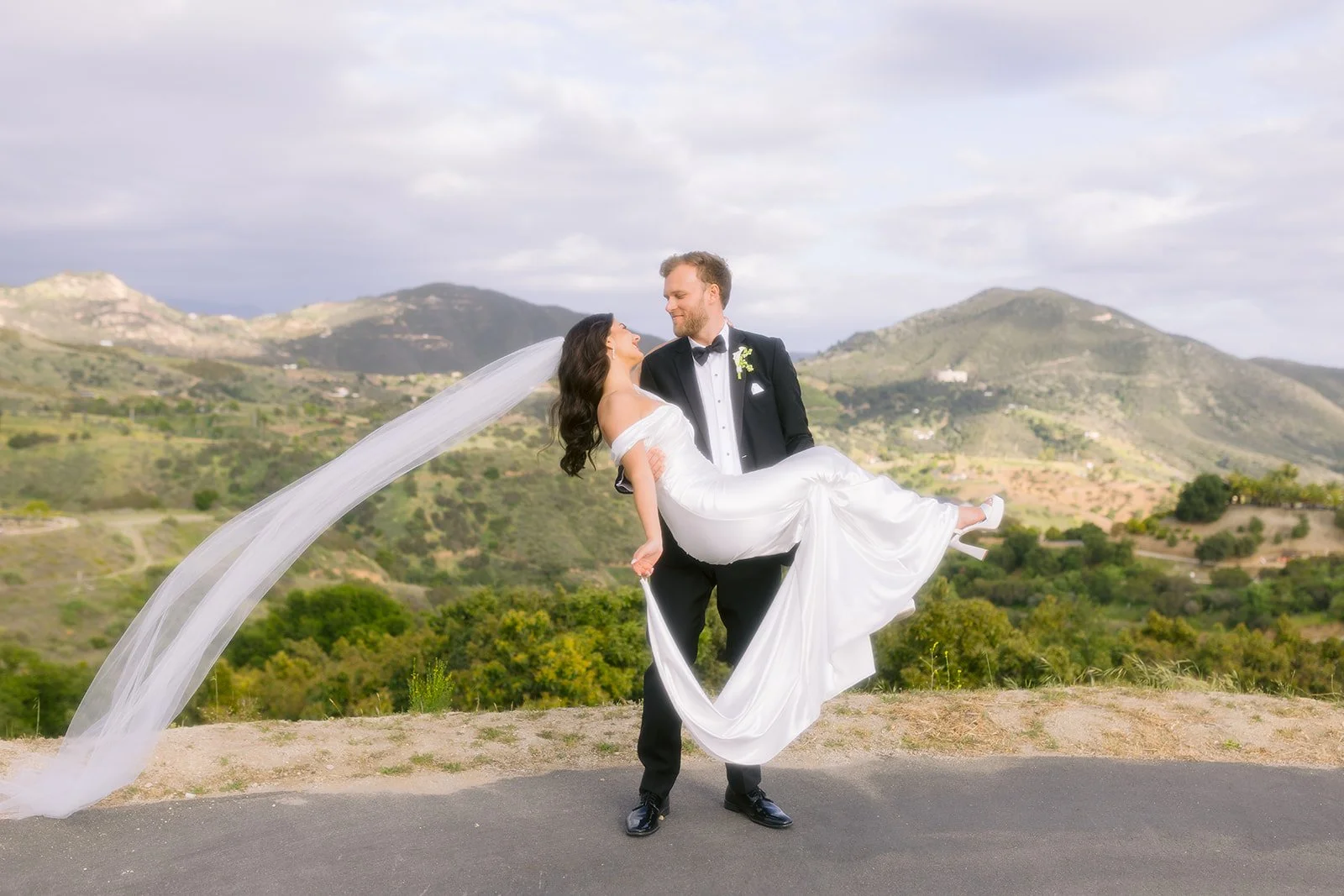 Joyful couple captured having a special moment outdoors.