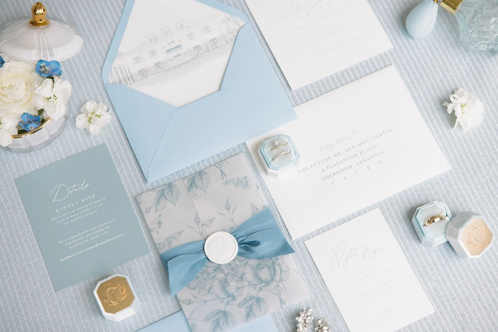 Detail flat lay image from a blue themed wedding.