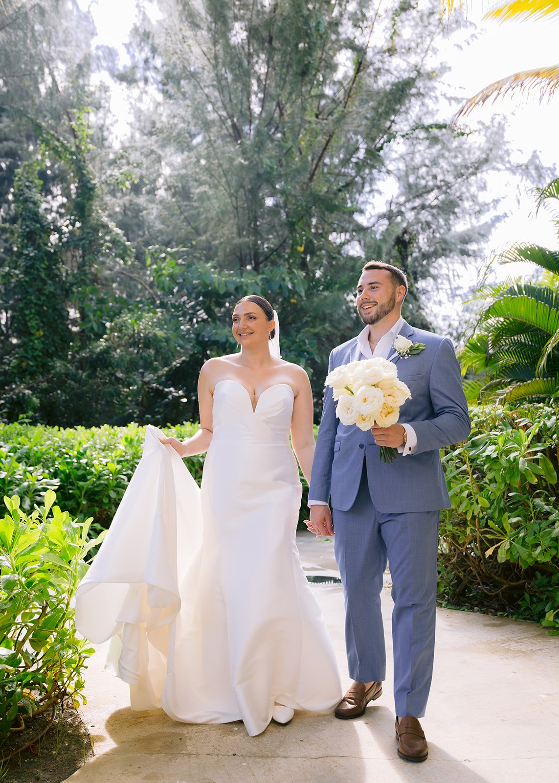 Fashion-inspired couple portrait with structured posing and sophisticated energy.