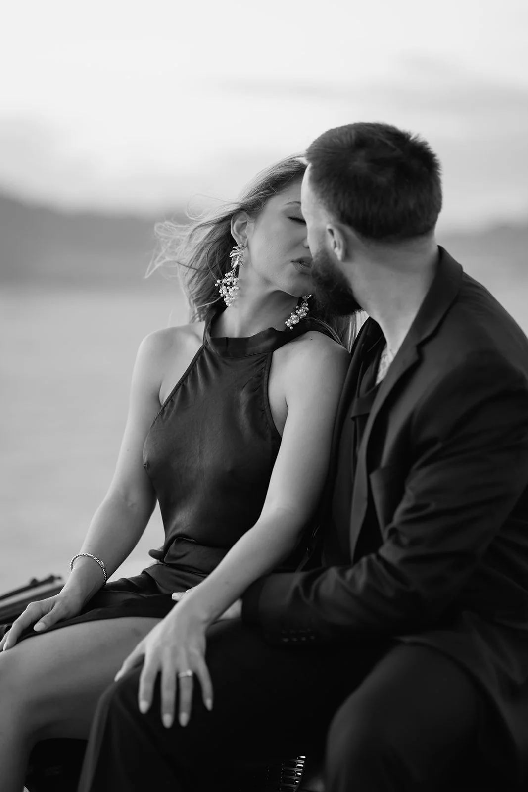 Intimate close-up portrait highlighting quiet connection between couple.