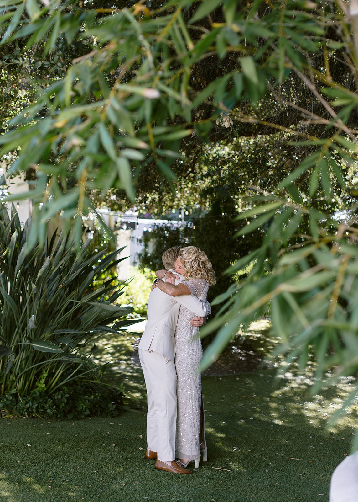 Groom shares an emotional embrace with his mom before the ceremony.