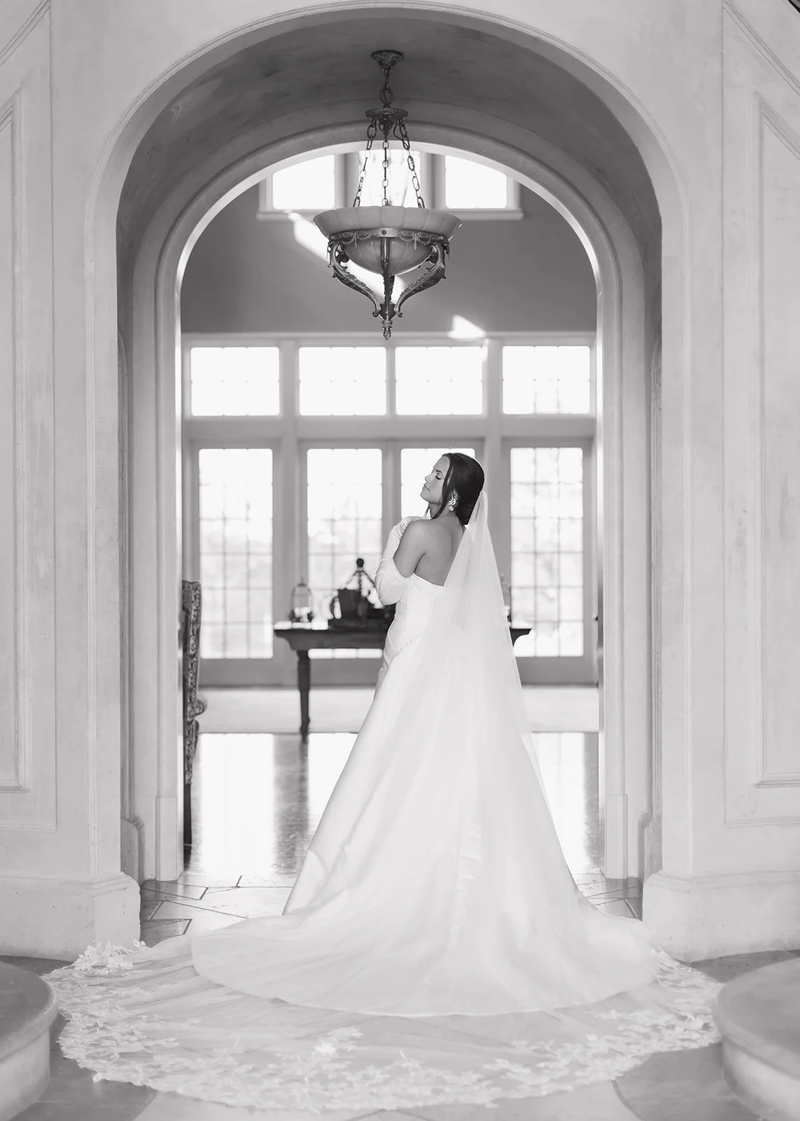 Fine art bridal portrait with romantic light and a gentle, modern aesthetic.