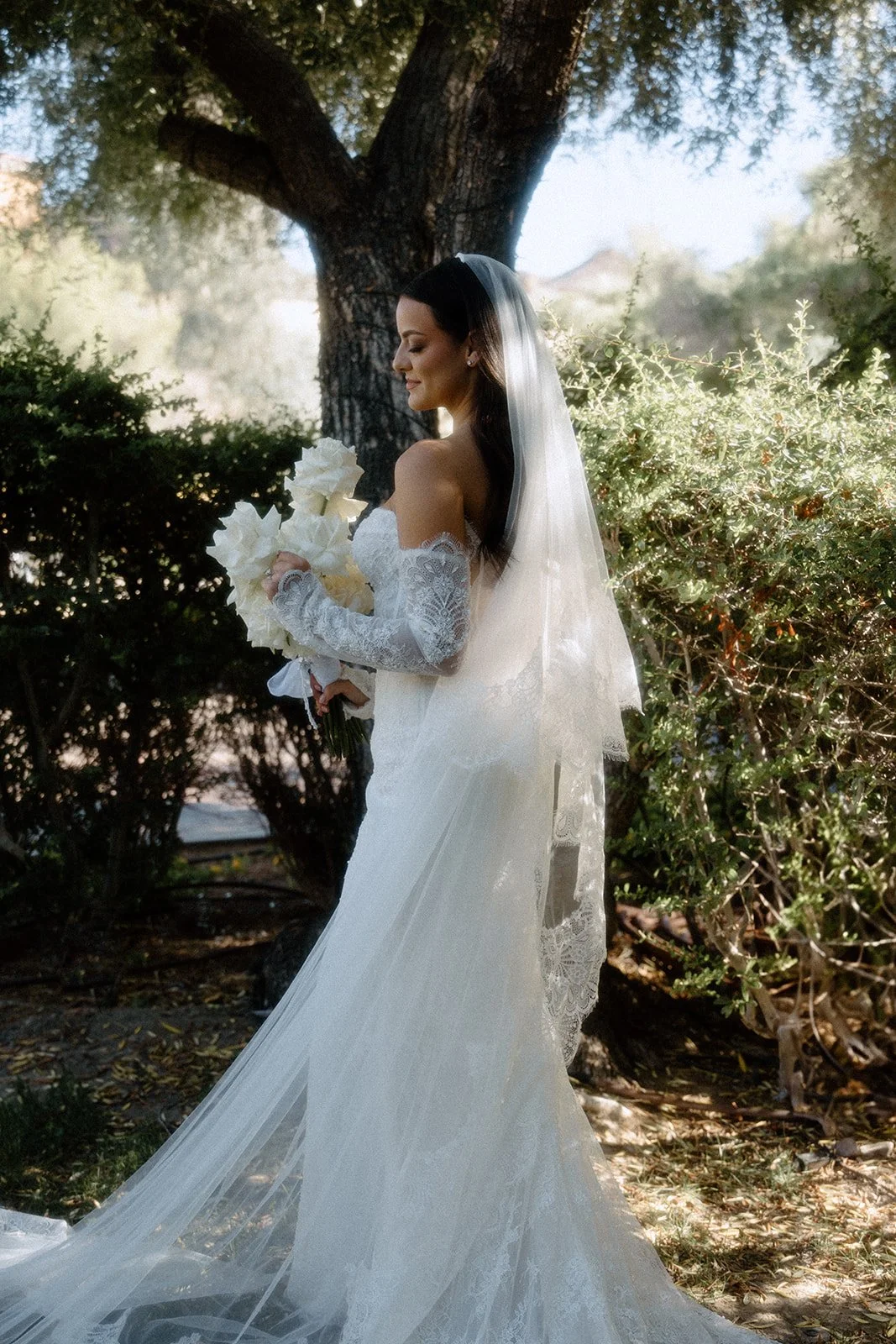 Refined bridal portrait in outside of the venue.