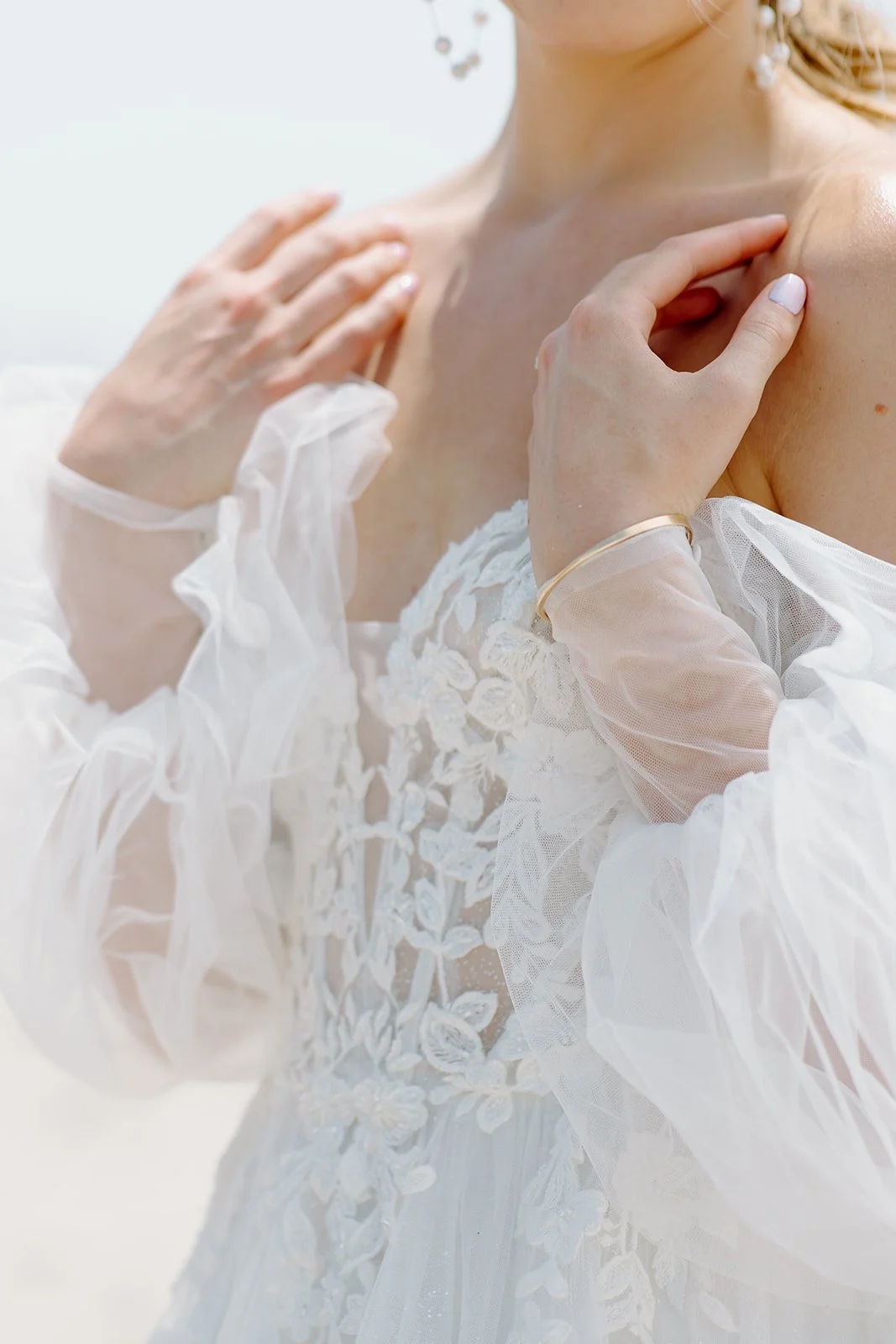 Luxury detail shot of bride's wedding dress.