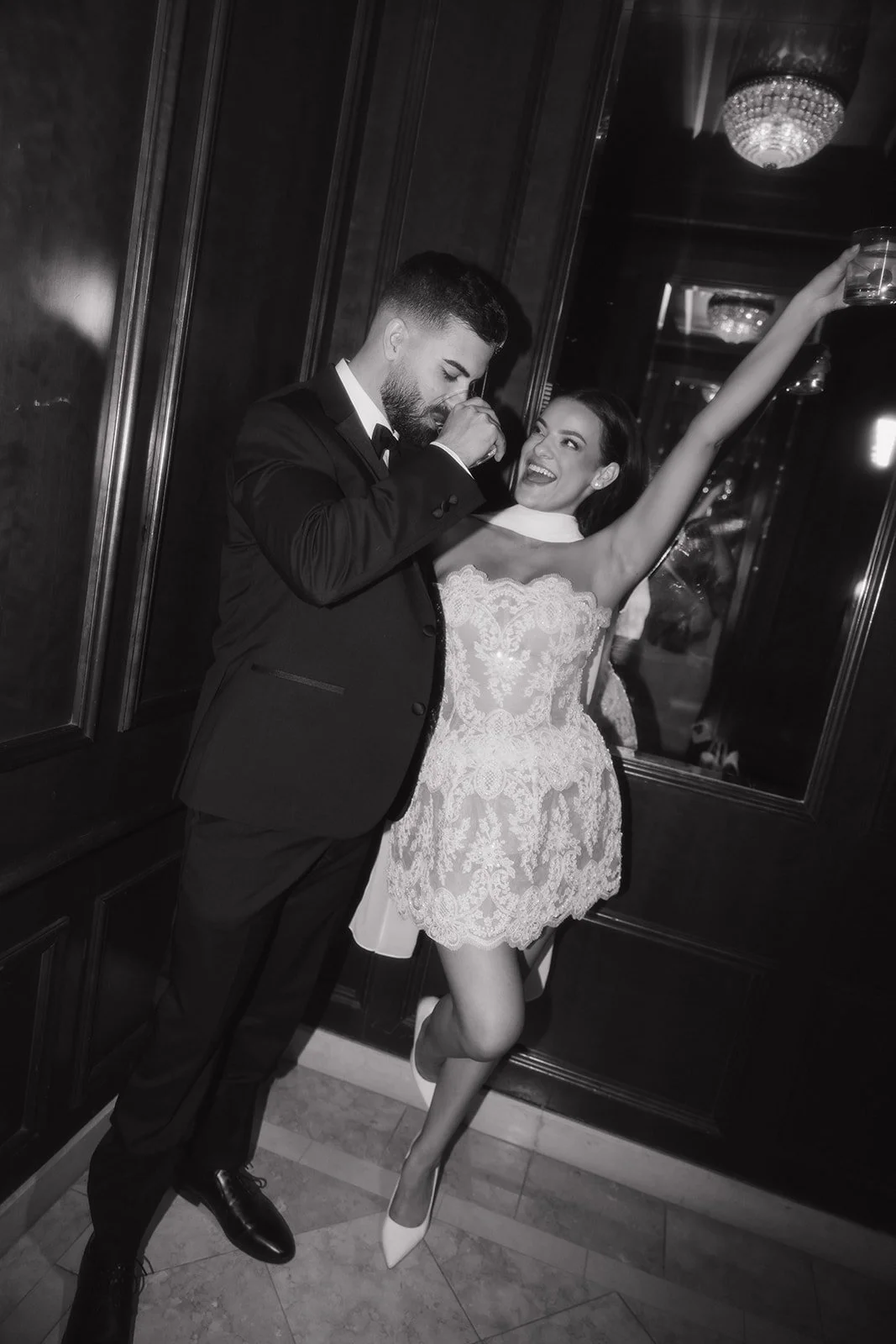 Bride and groom partying at their reception.