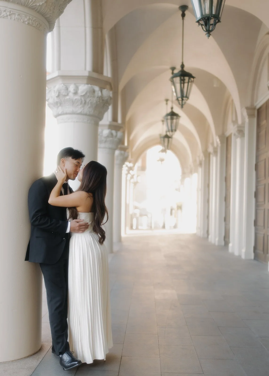 Structured engagement portrait with balanced composition.