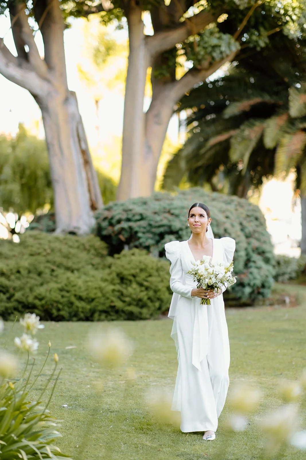 Modern bridal portrait in open setting.