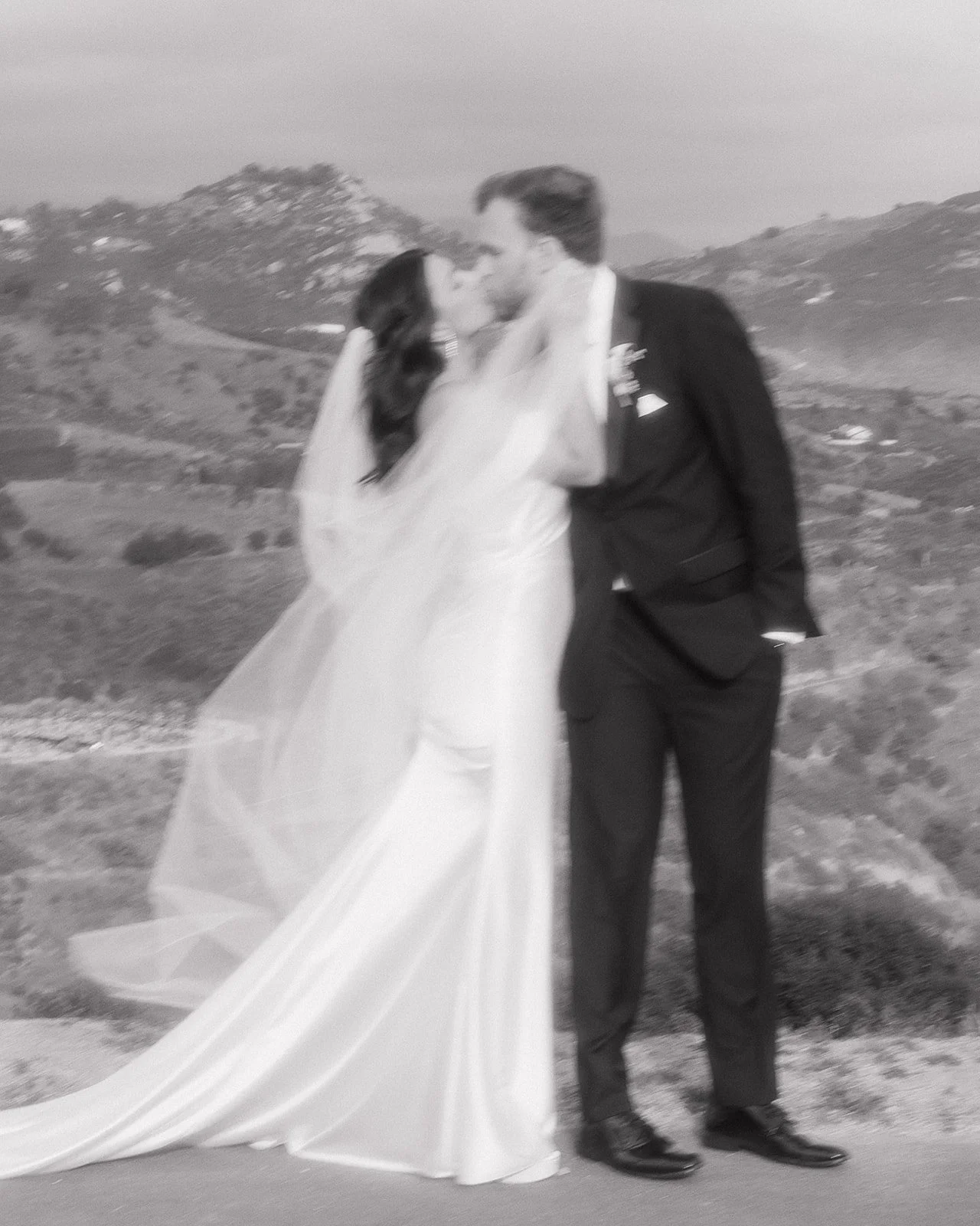 Formal couple portrait at elegant venue.
