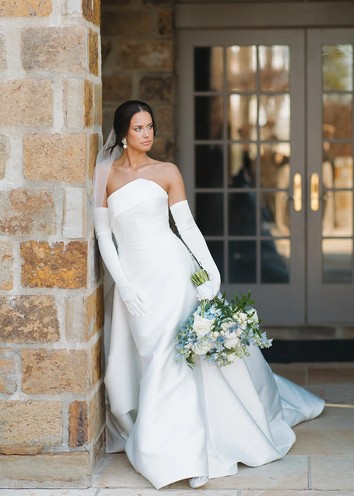 Fine art wedding portrait of bride posing.