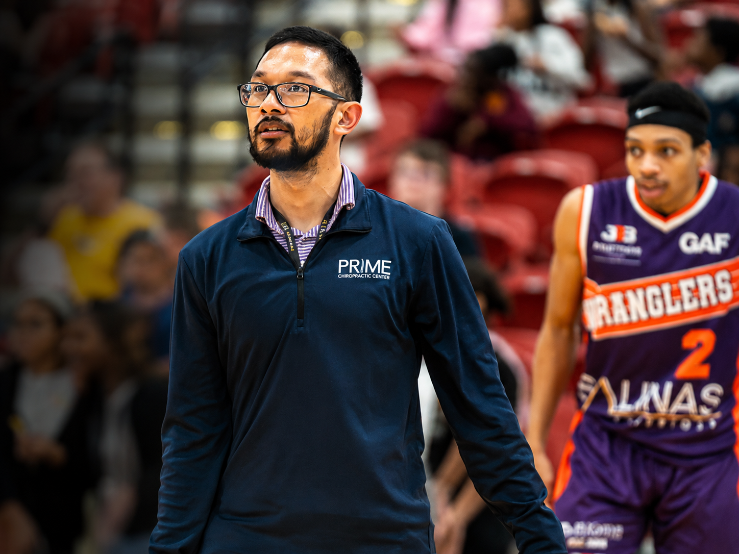 Dr. Ryan de Rosales on the court during a Glass City Wranglers basketball game in Toledo, Ohio