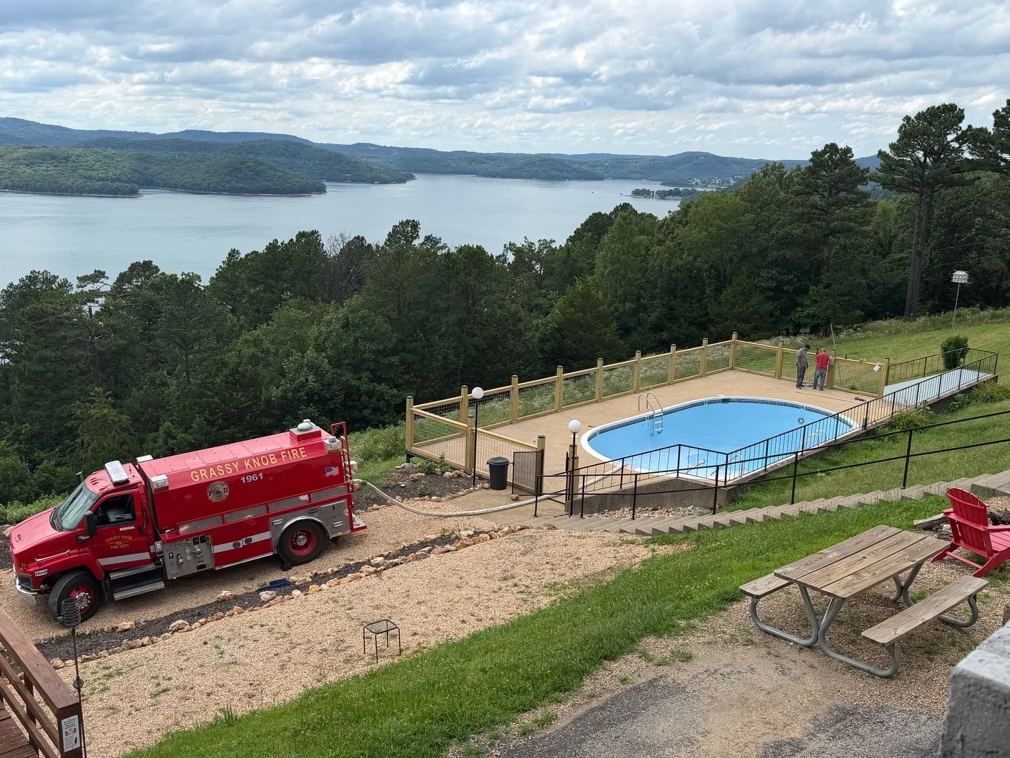 The Grassy Knob fire department practicing with their pump truck by filling the pool!