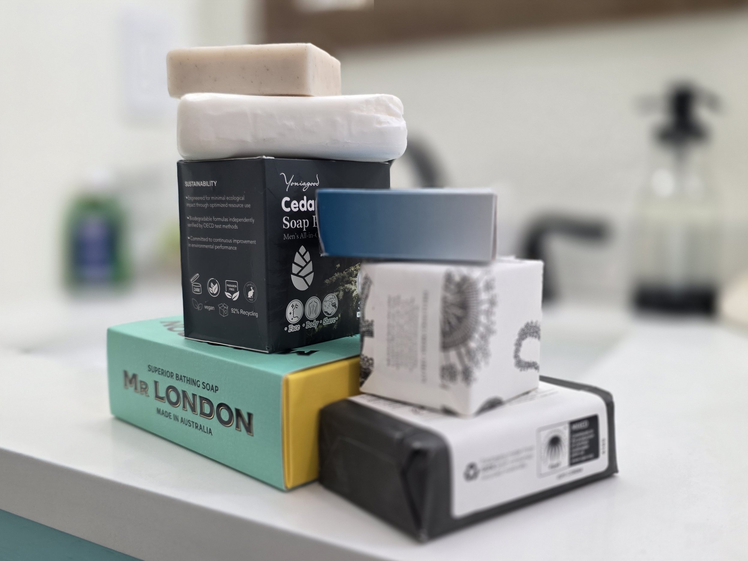 What are the benefits of using natural soaps over commercial ones?