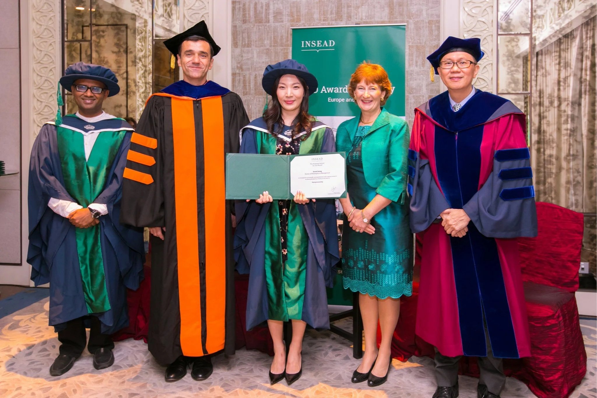 Hooded at last at INSEAD! I got my PhD in Management, specializing in Organizational Theory and Entrepreneurship. More than anything, those years taught me to be a thoughtful steward of my “idea-children” -- to nurture them with rigor and patience, b
